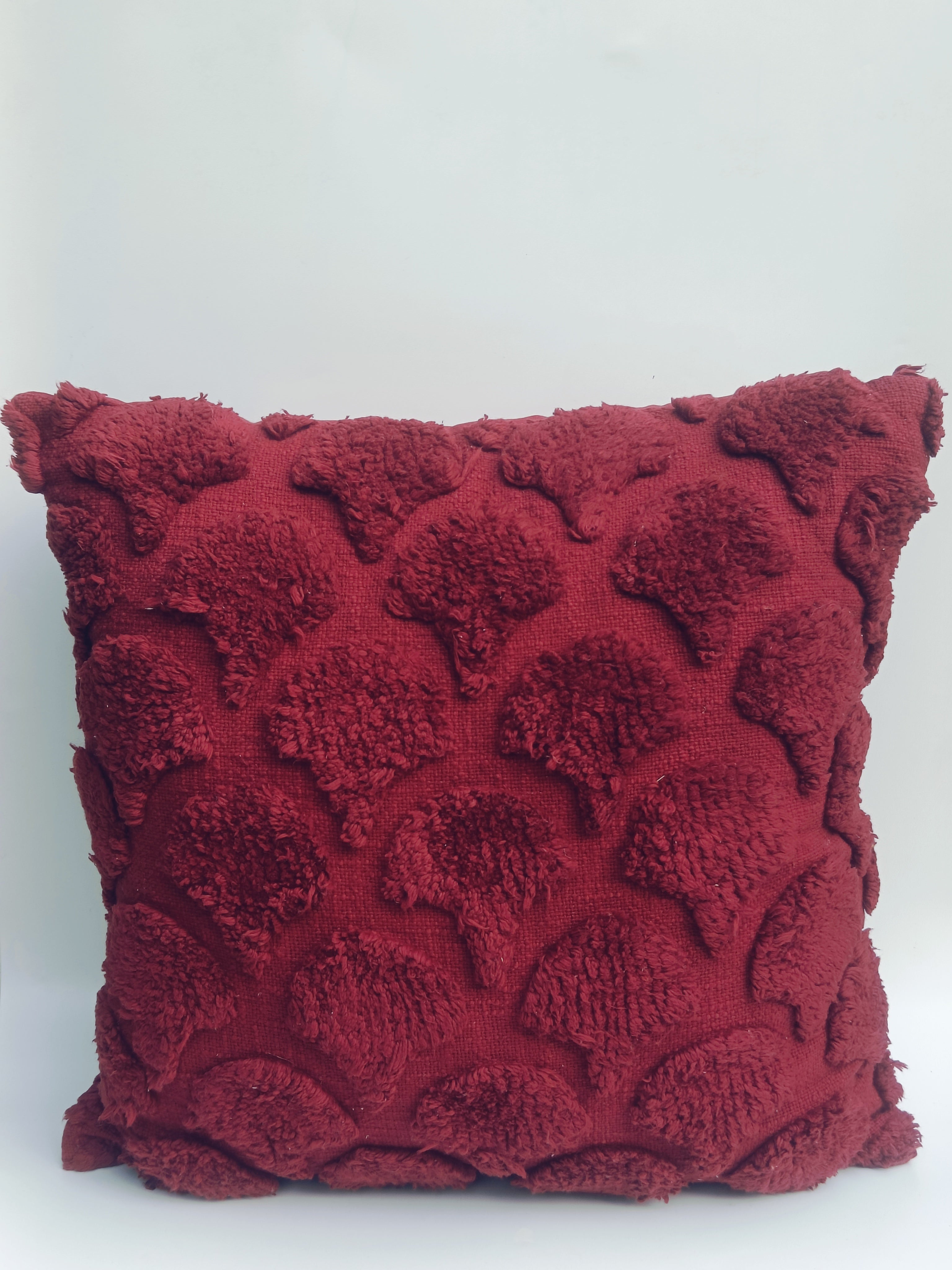 Deep Red Textured Cushion with Raised Leaf Motifs