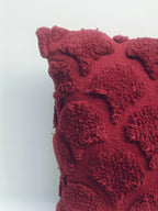 Deep Red Textured Cushion with Raised Leaf Motifs