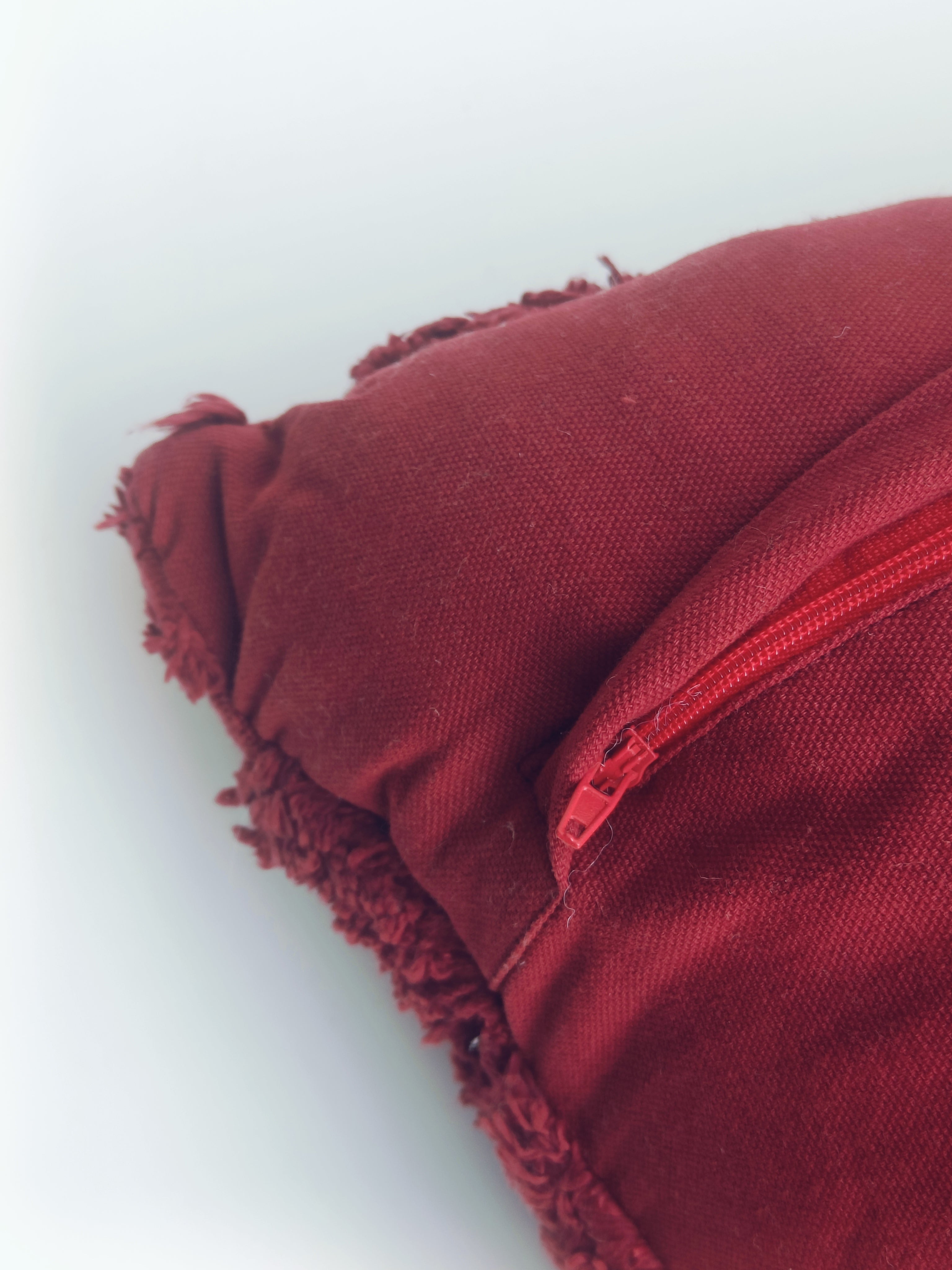 Deep Red Textured Cushion with Raised Leaf Motifs