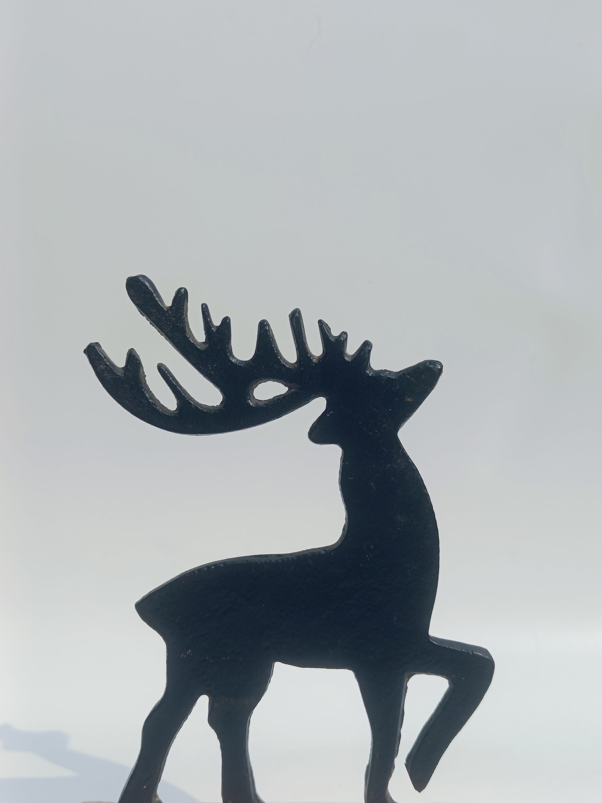 Rustic Iron Reindeer Figurine on Wooden Base