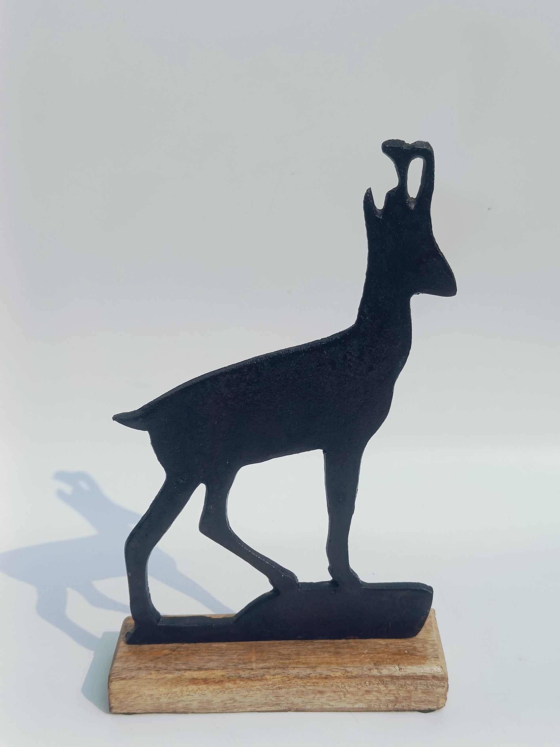 Iron Deer Silhouette on Wooden Base