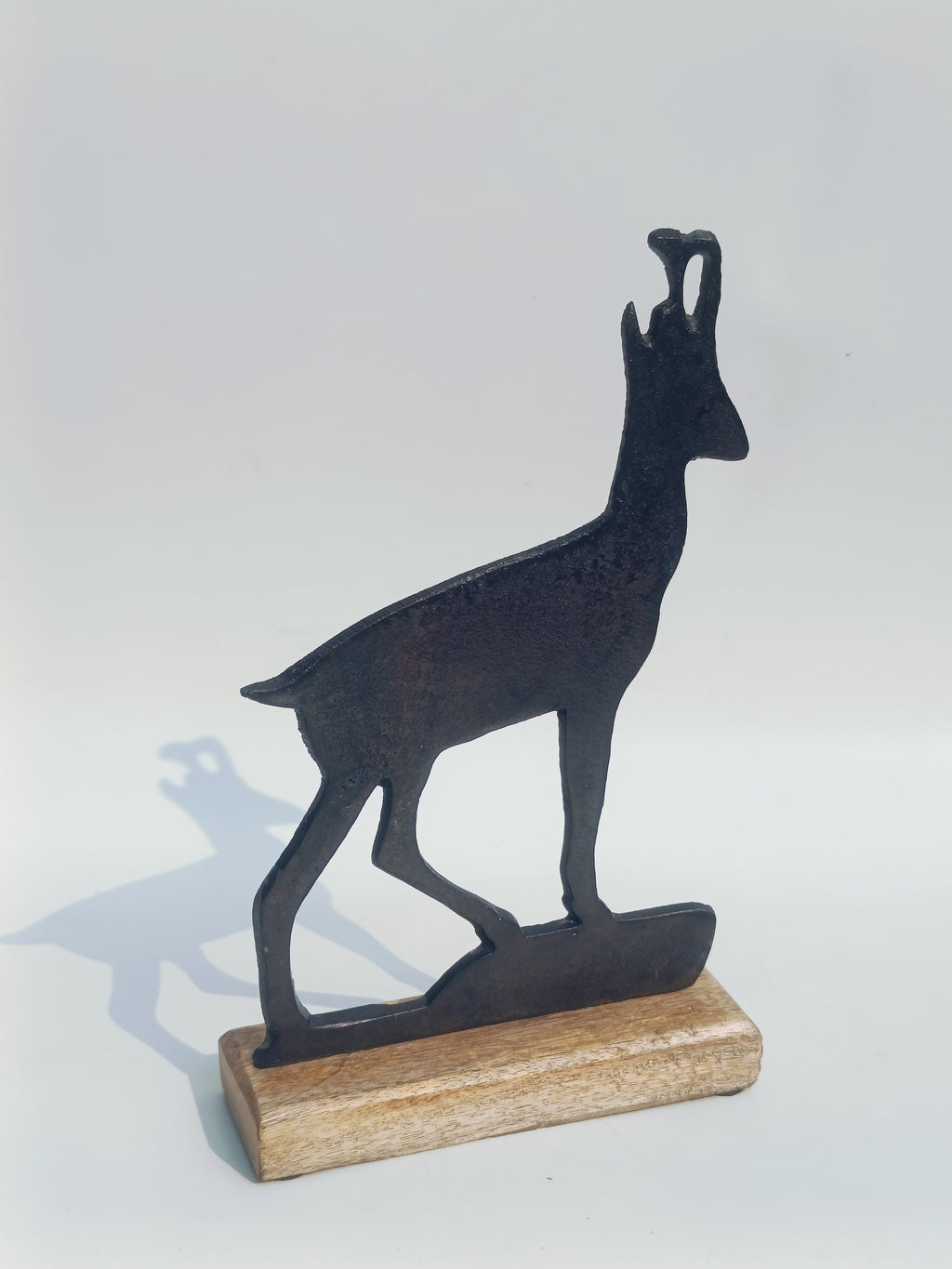 Iron Deer Silhouette on Wooden Base
