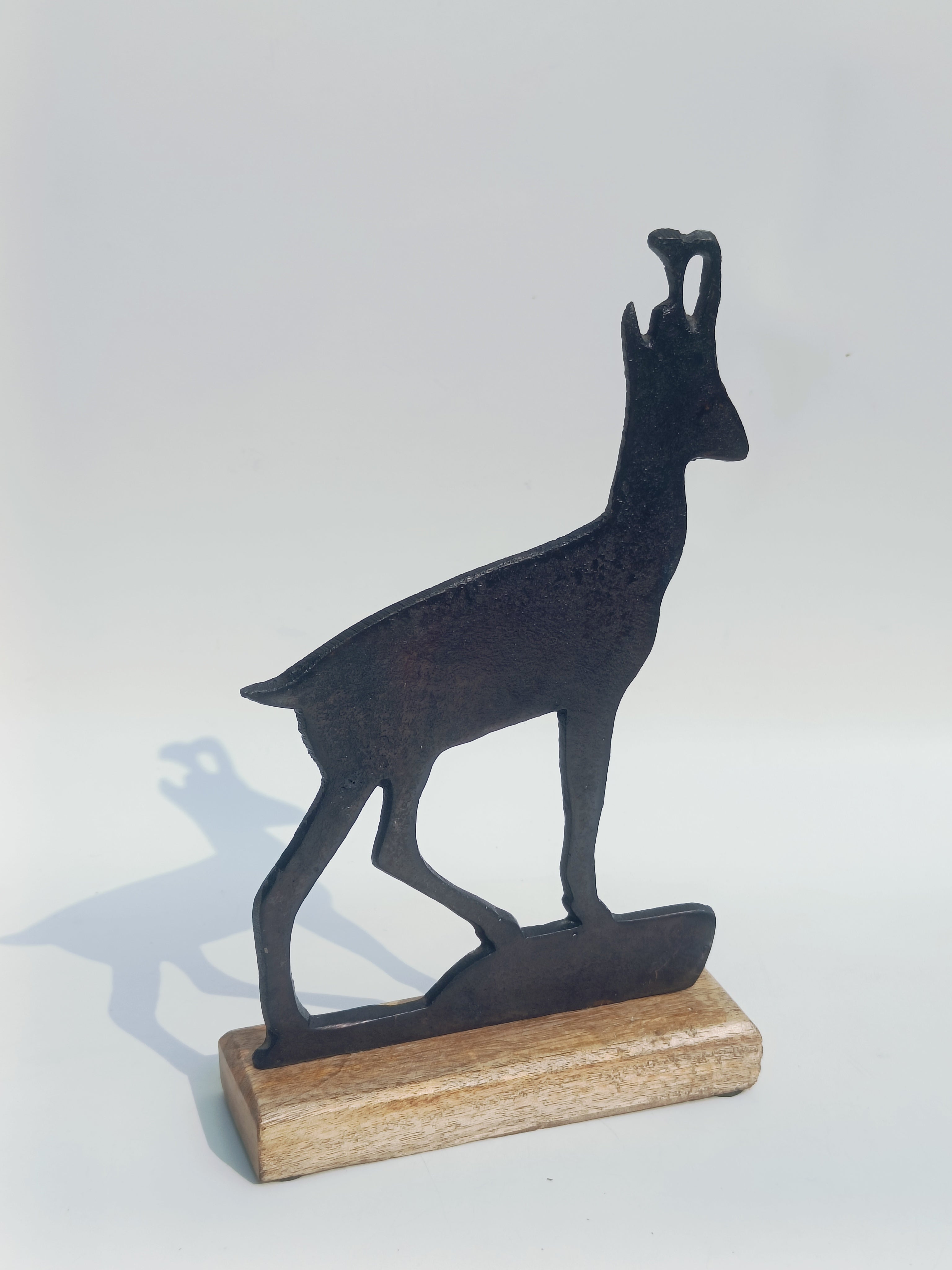 Iron Deer Silhouette on Wooden Base