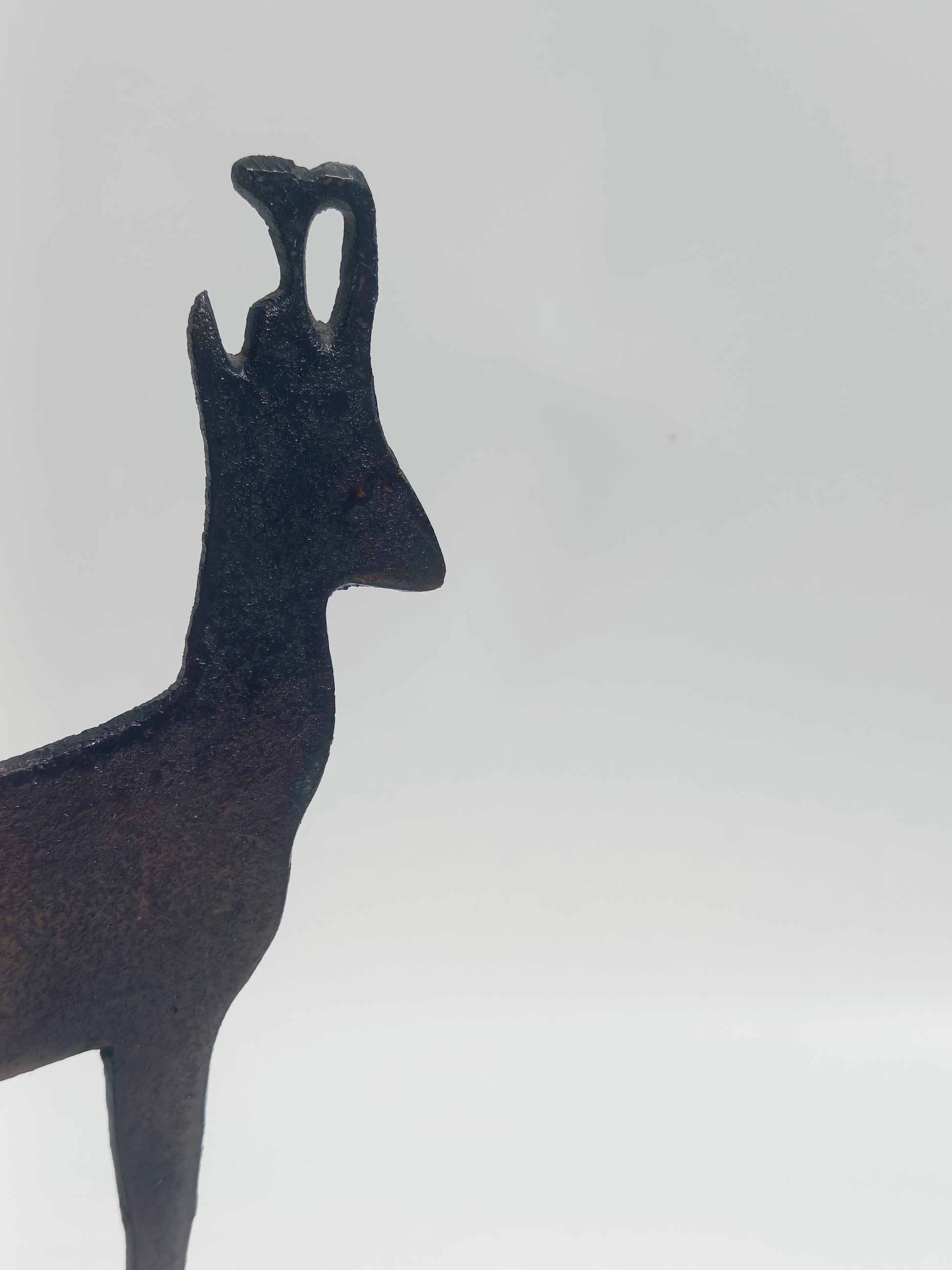 Iron Deer Silhouette on Wooden Base