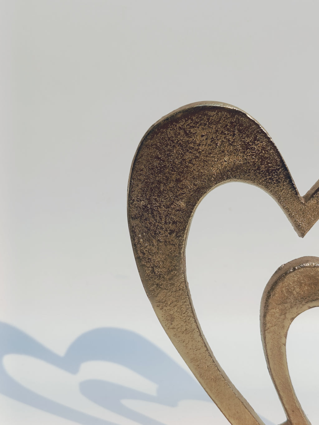 Eternal Bond – Twin Heart Metal Sculpture on Wooden Base
