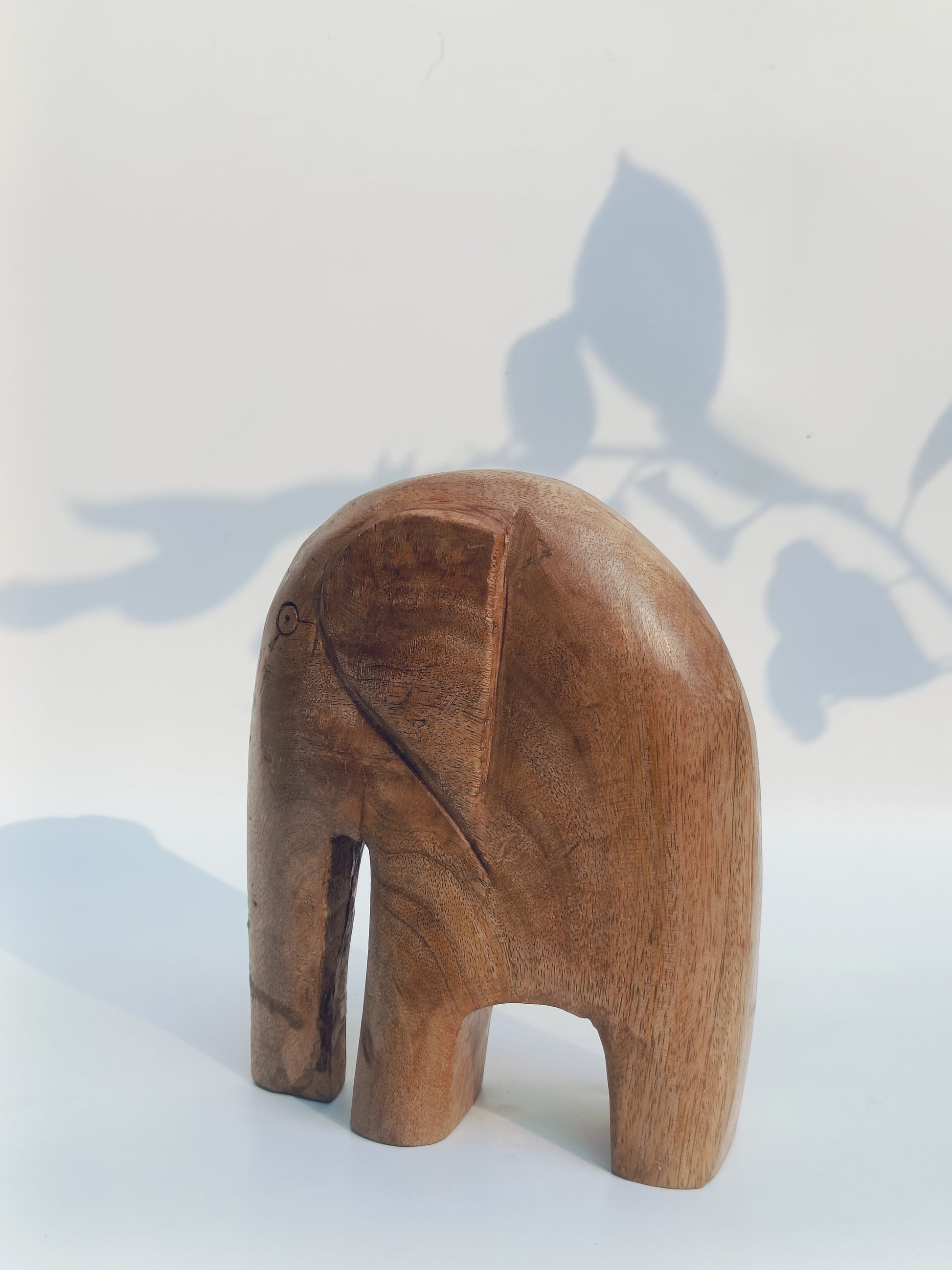 Hand-Carved Minimalist Elephant Sculpture – Natural Wood
