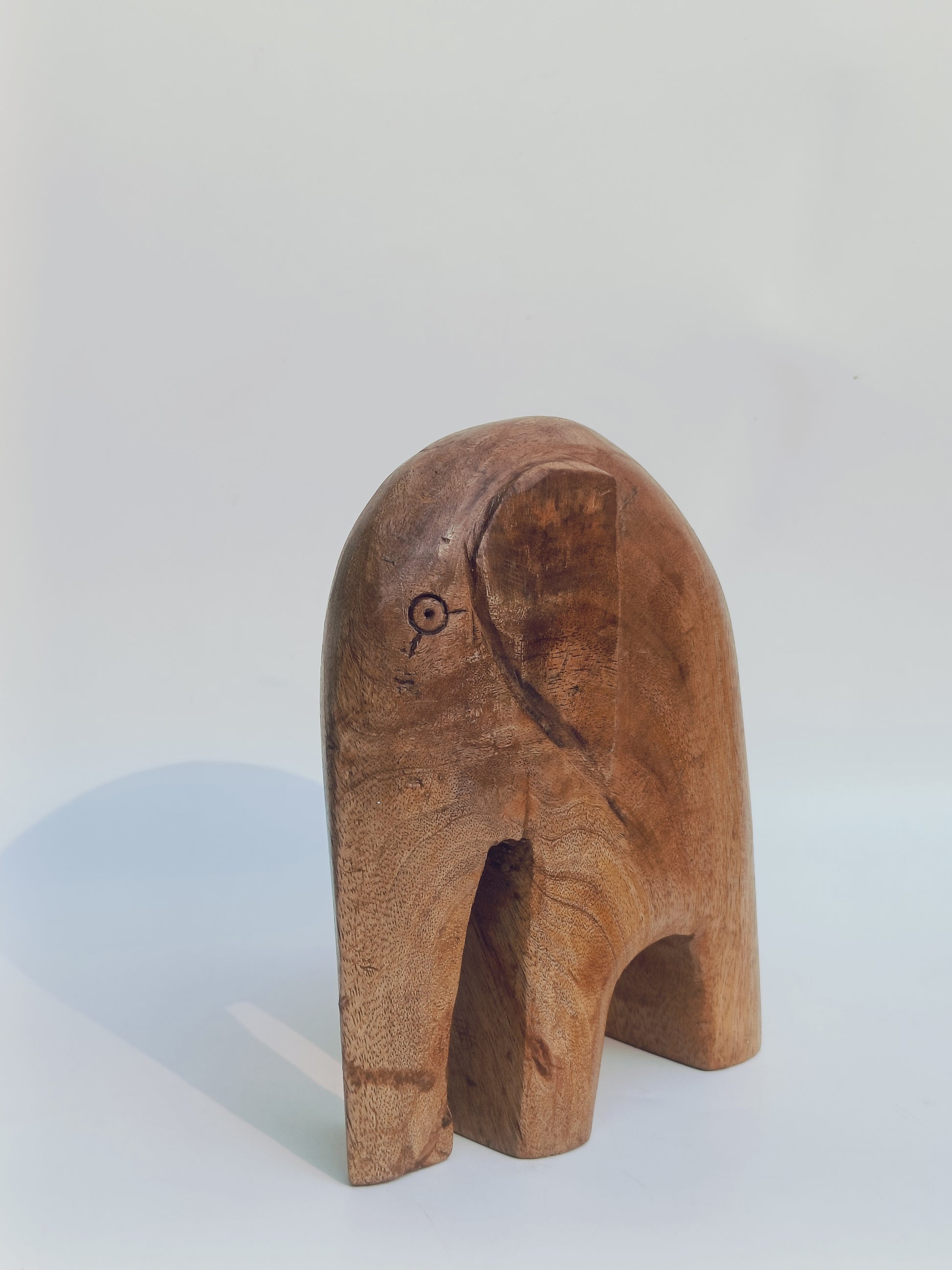 Hand-Carved Minimalist Elephant Sculpture – Natural Wood