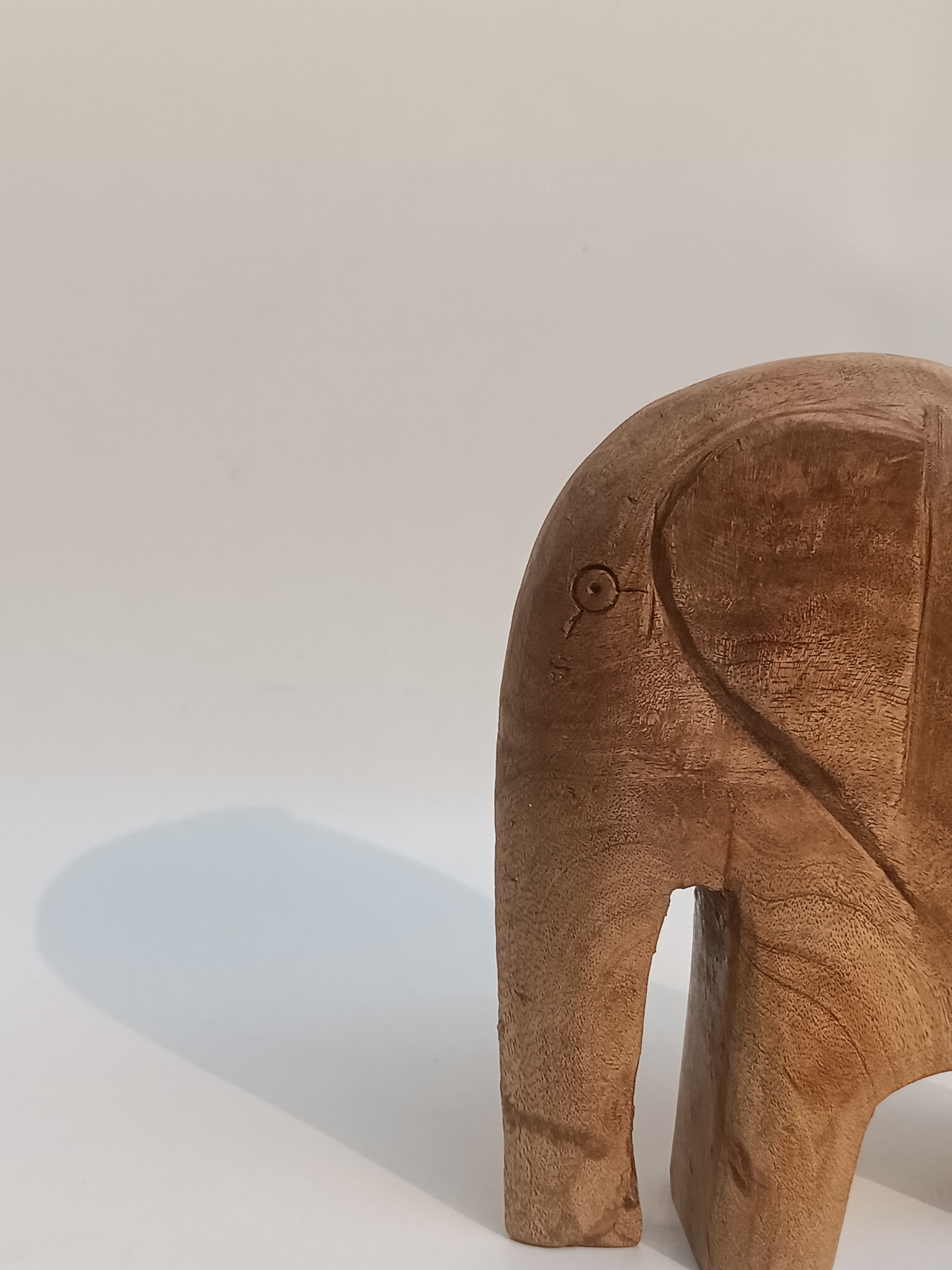 Hand-Carved Minimalist Elephant Sculpture – Natural Wood