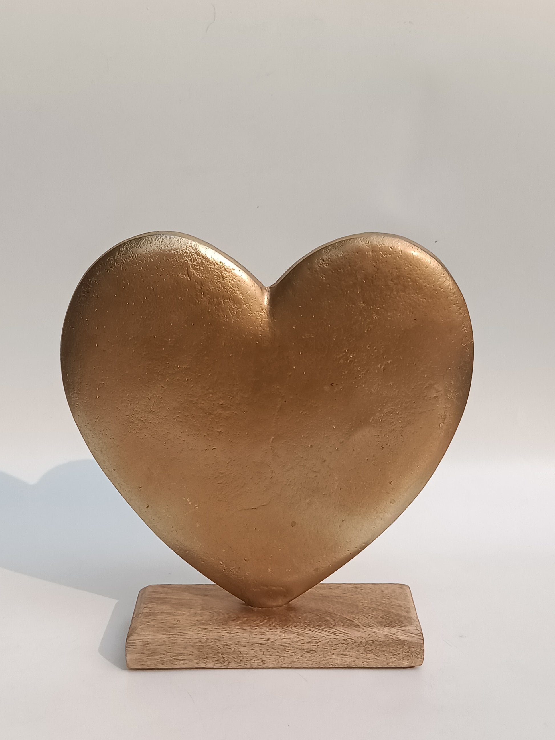Golden Heart Table Accent – Elegance in Metal & Wood