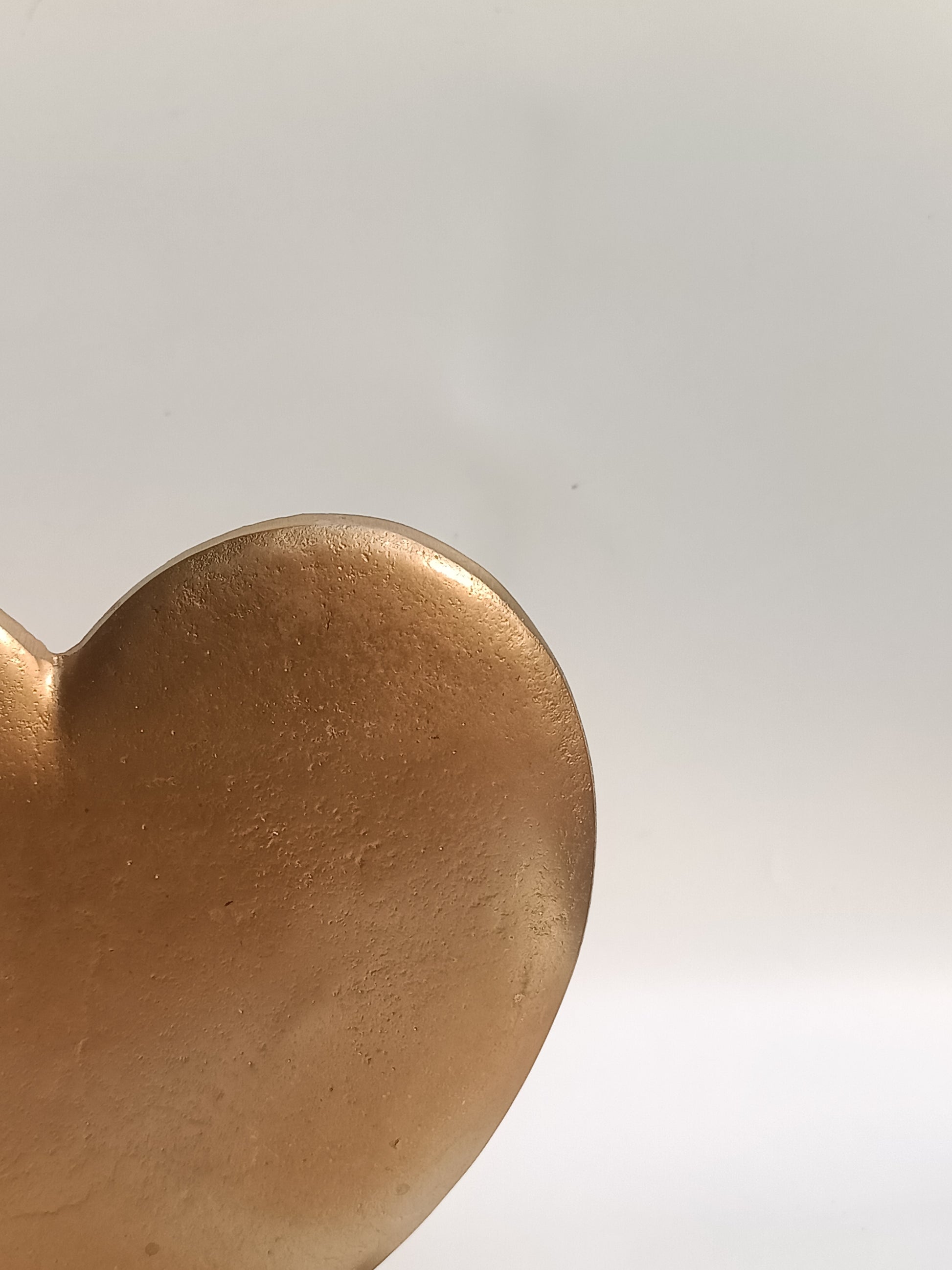 Golden Heart Table Accent – Elegance in Metal & Wood