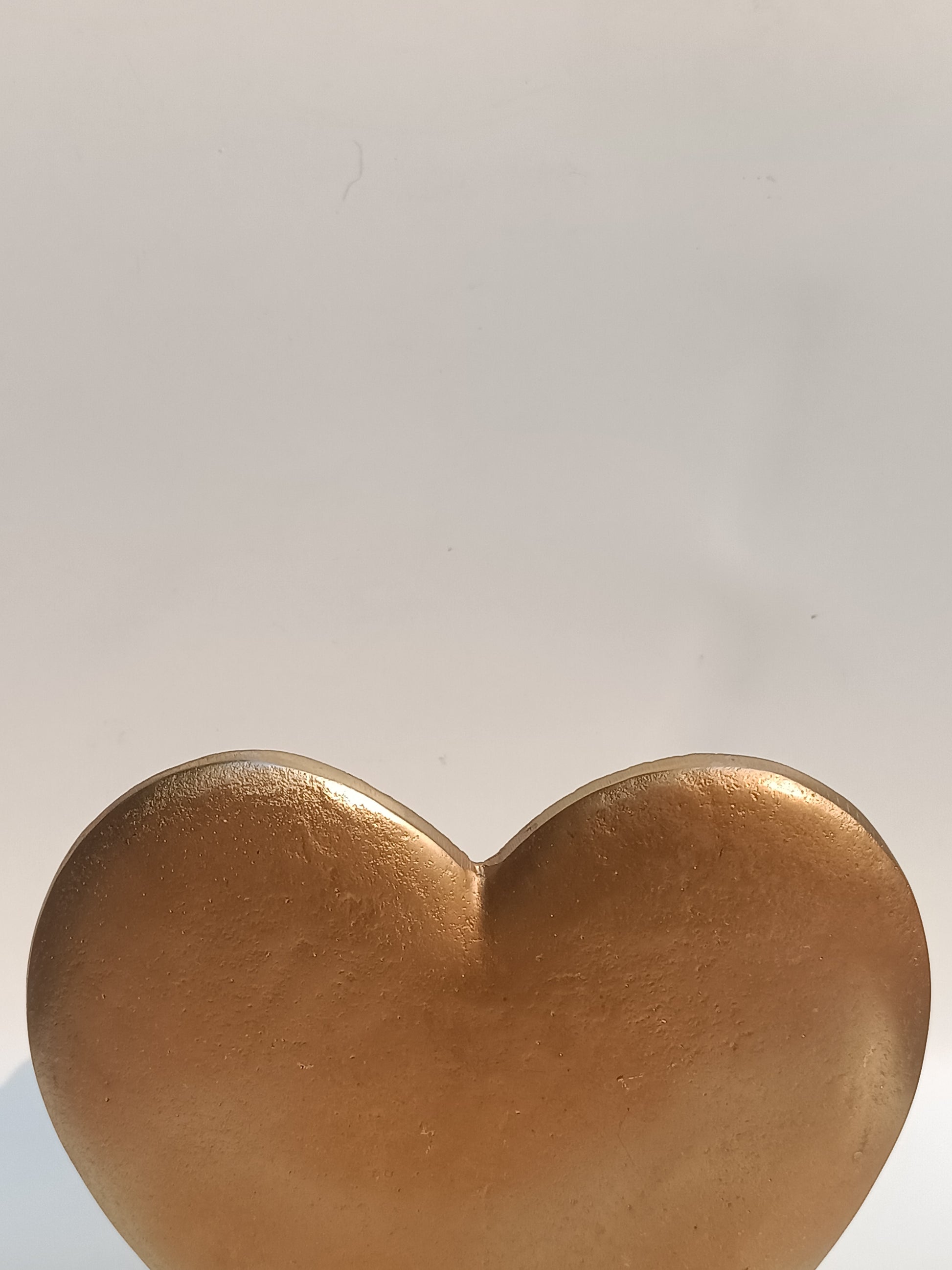 Golden Heart Table Accent – Elegance in Metal & Wood