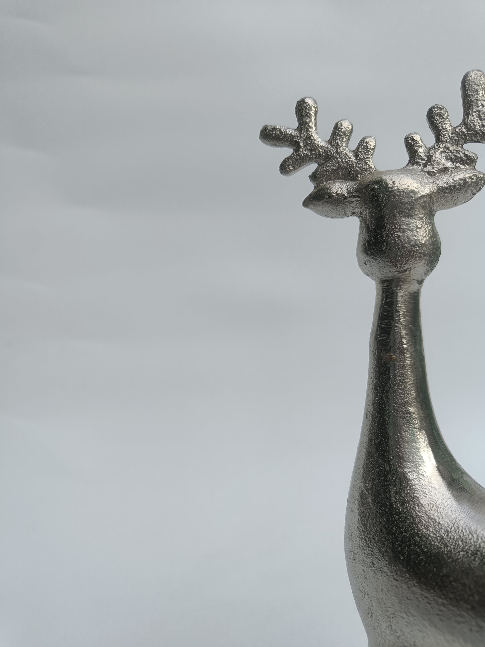 Rustic Silver Reindeer Figurine with Wooden Base