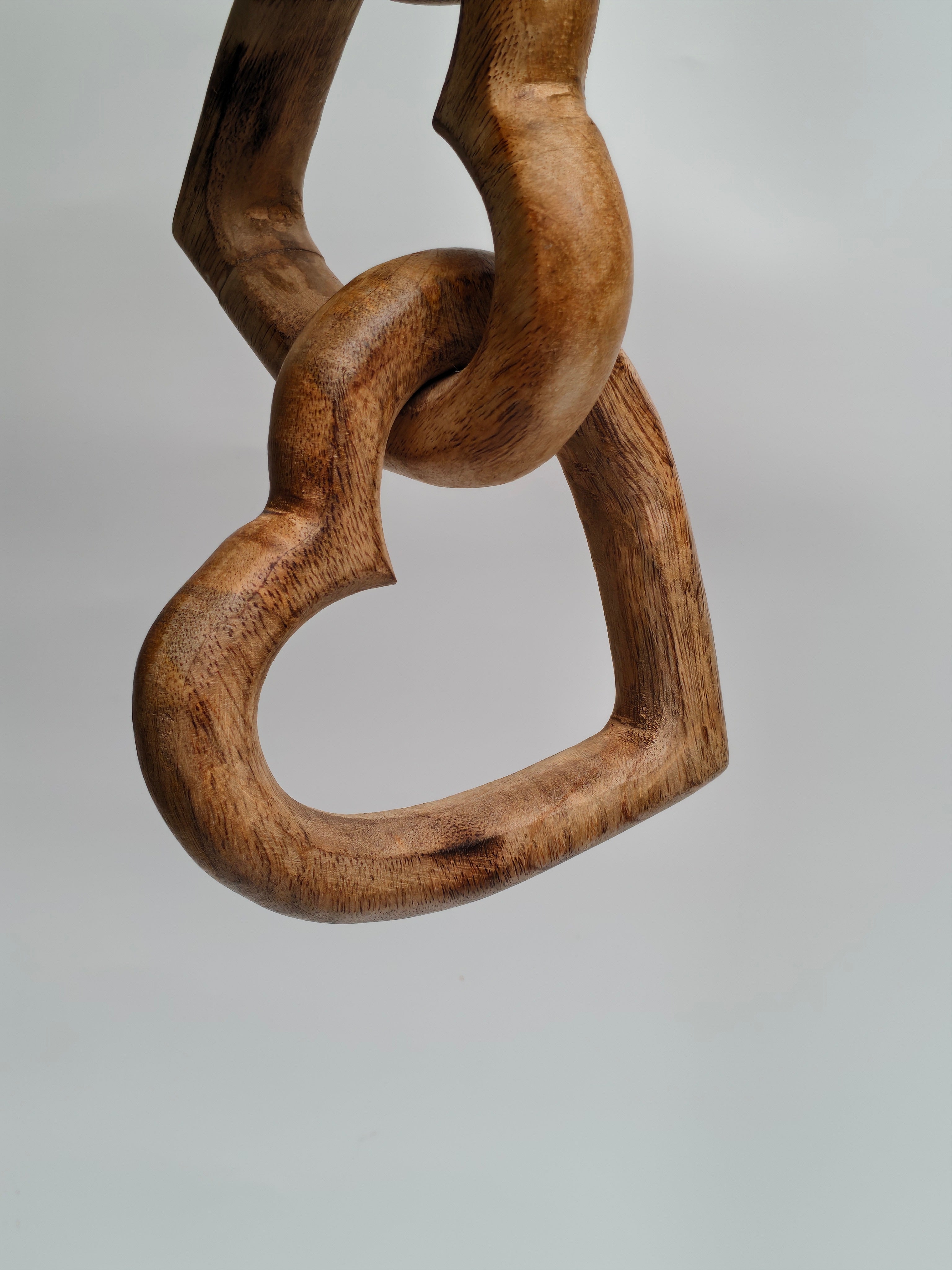 Hand-Carved Interlocking Wooden Hearts Sculpture