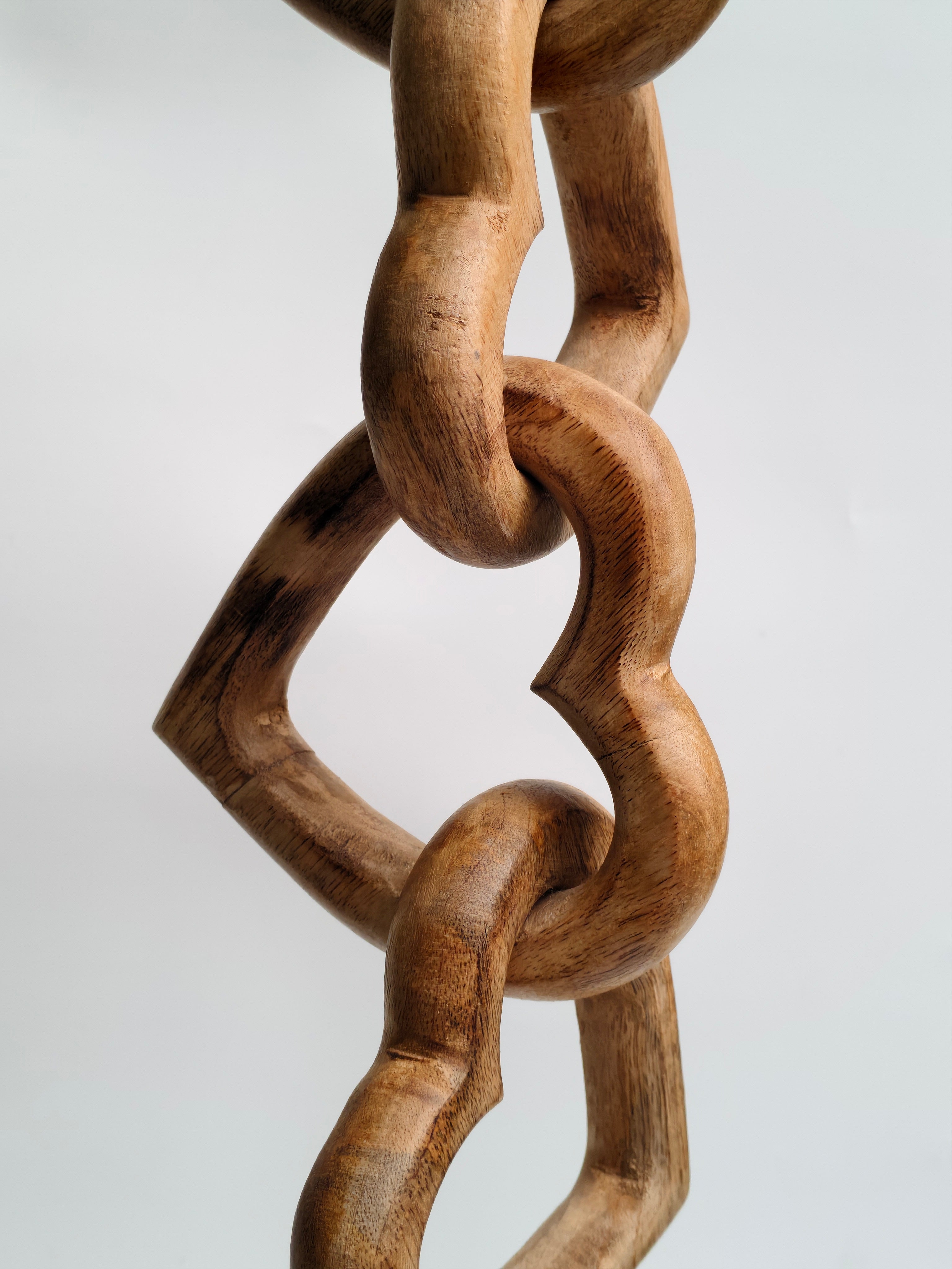 Hand-Carved Interlocking Wooden Hearts Sculpture