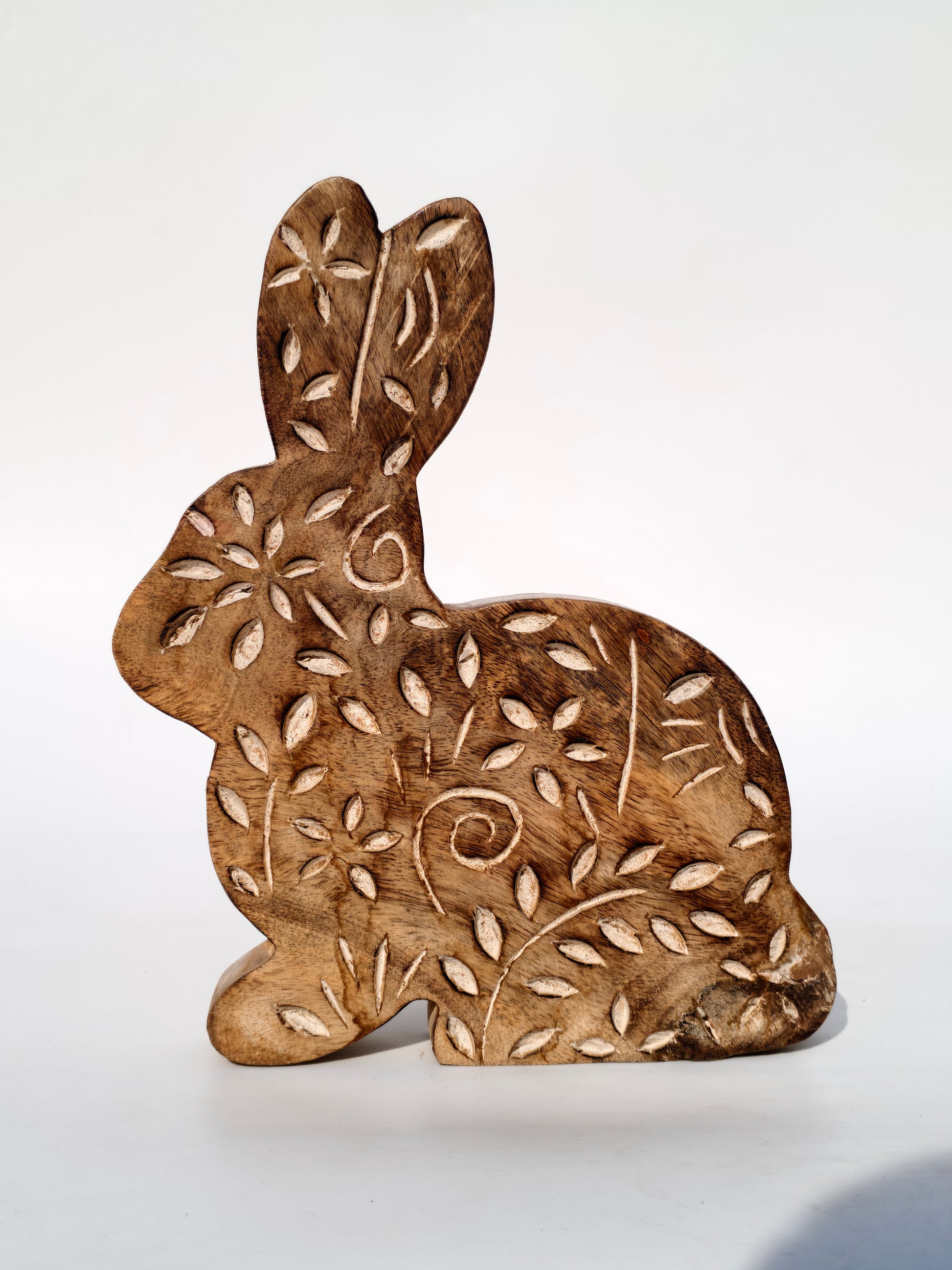 Handcrafted Wooden Bunny with Leaf Carvings