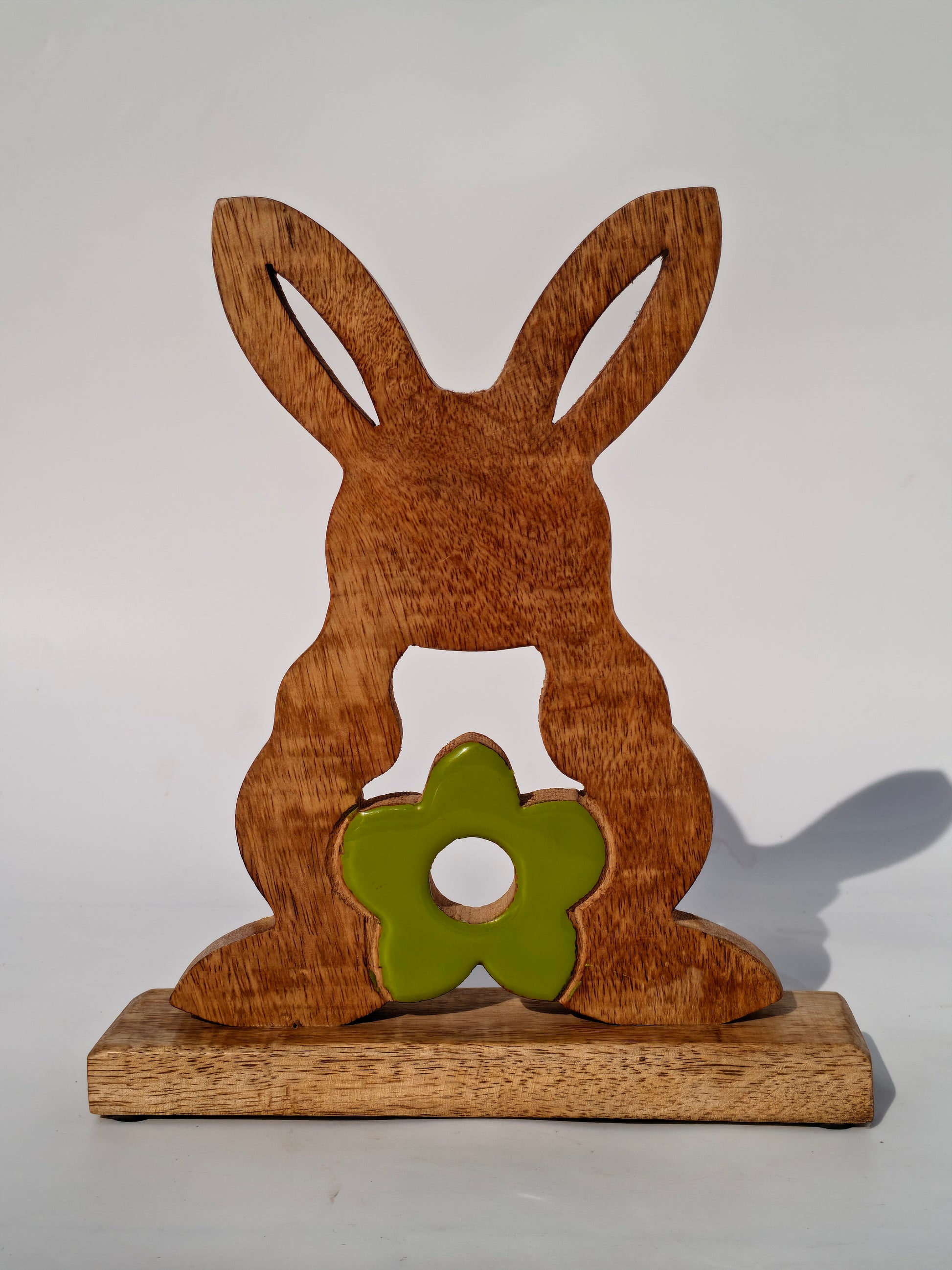 Handcrafted Wooden Bunny with Green Floral Accent