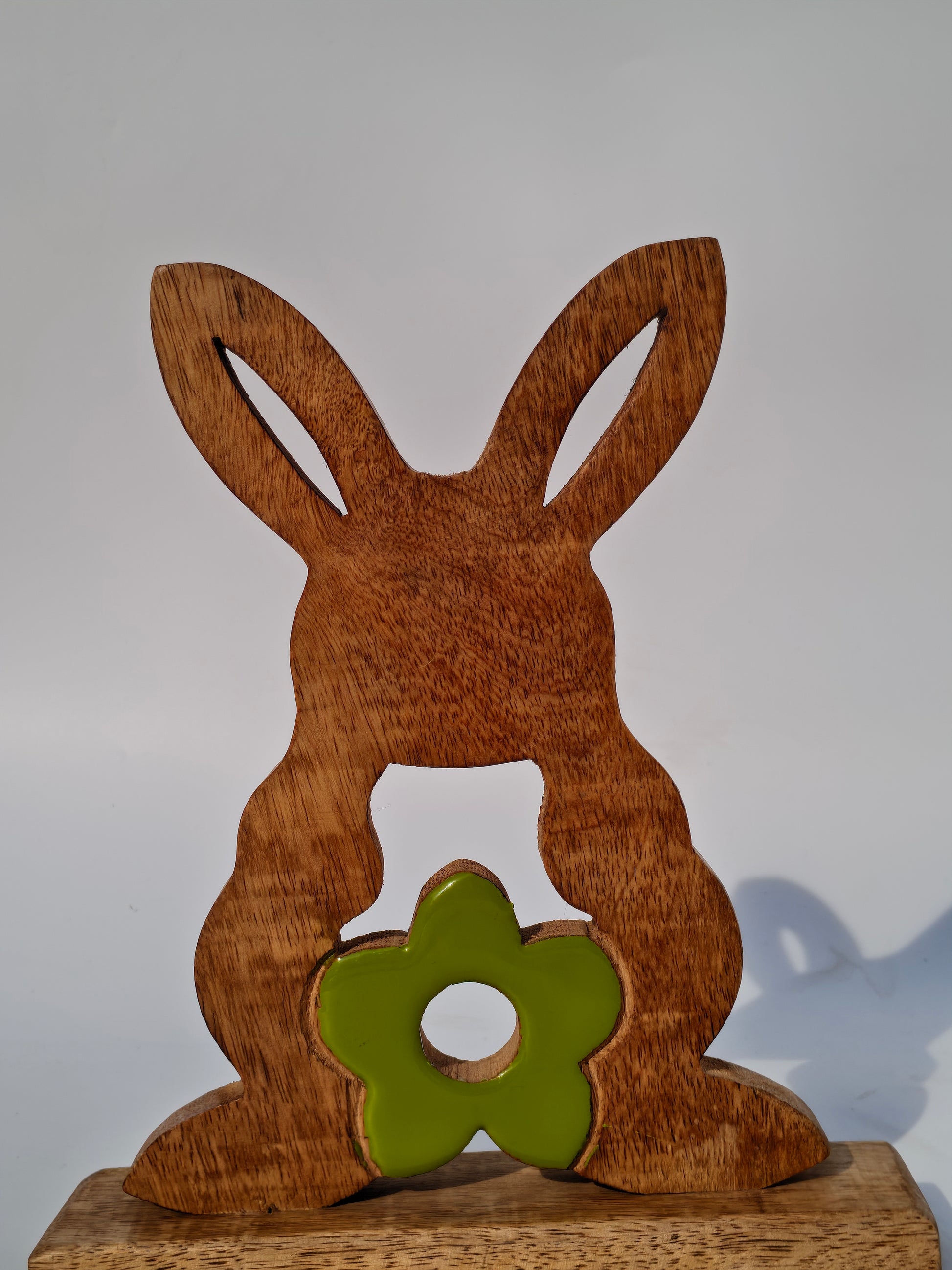 Handcrafted Wooden Bunny with Green Floral Accent