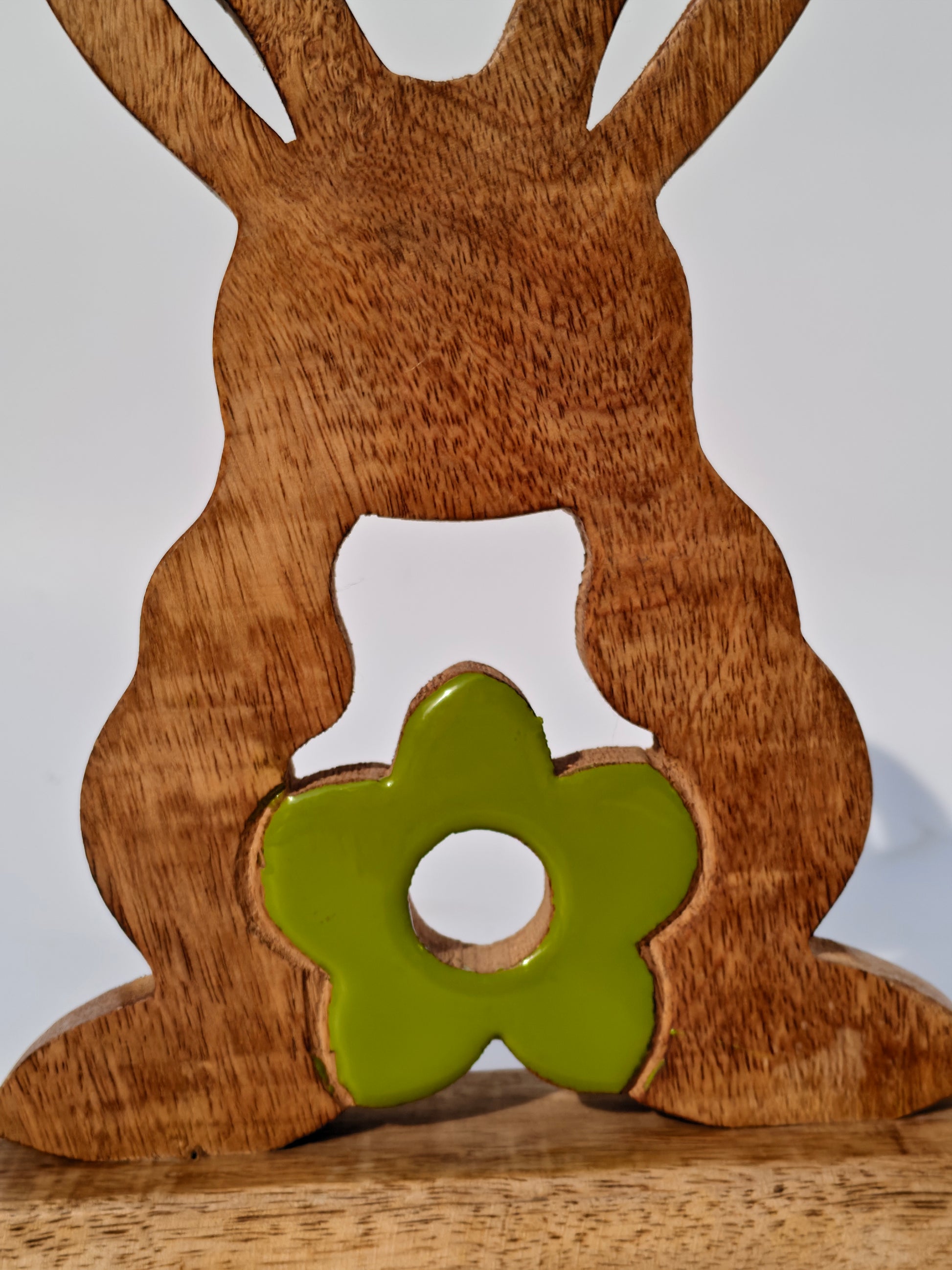 Handcrafted Wooden Bunny with Green Floral Accent