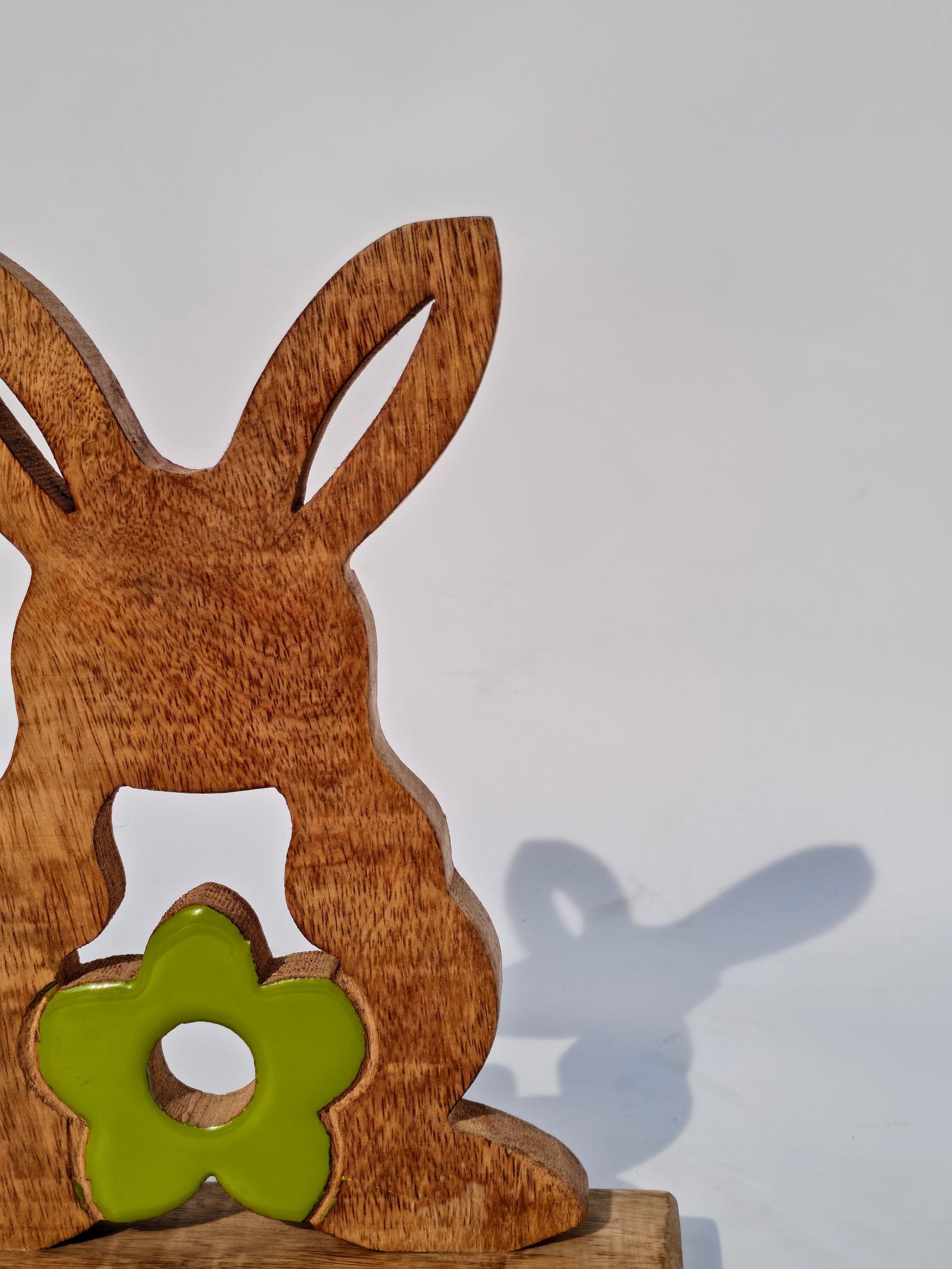 Handcrafted Wooden Bunny with Green Floral Accent