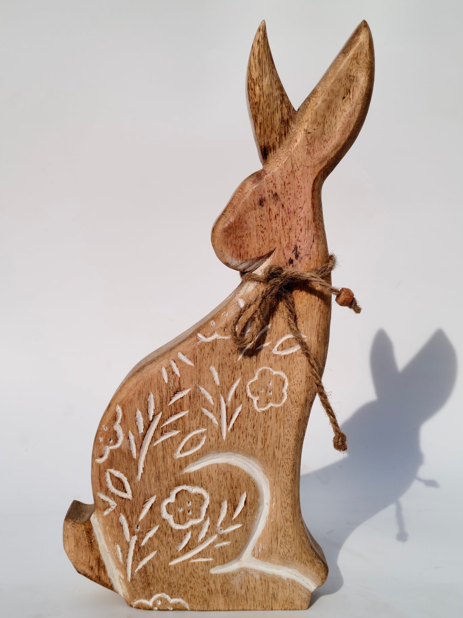 Handcrafted Wooden Bunny Figurine with Floral Carving