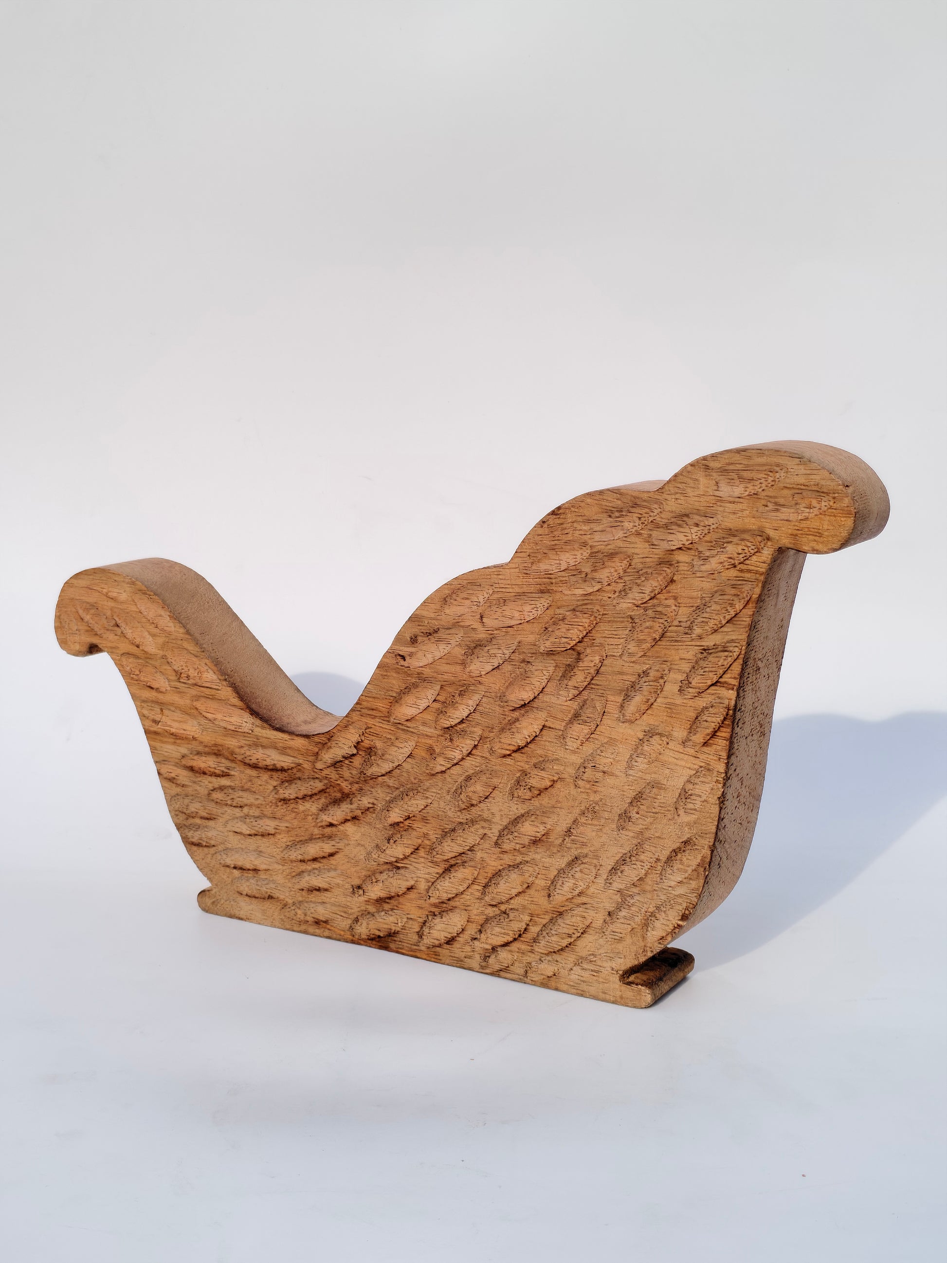 Handcrafted Wooden Sleigh Cutout with Floral Carvings – Rustic Christmas Décor