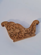 Wooden Sleigh Cutout with Floral Carvings