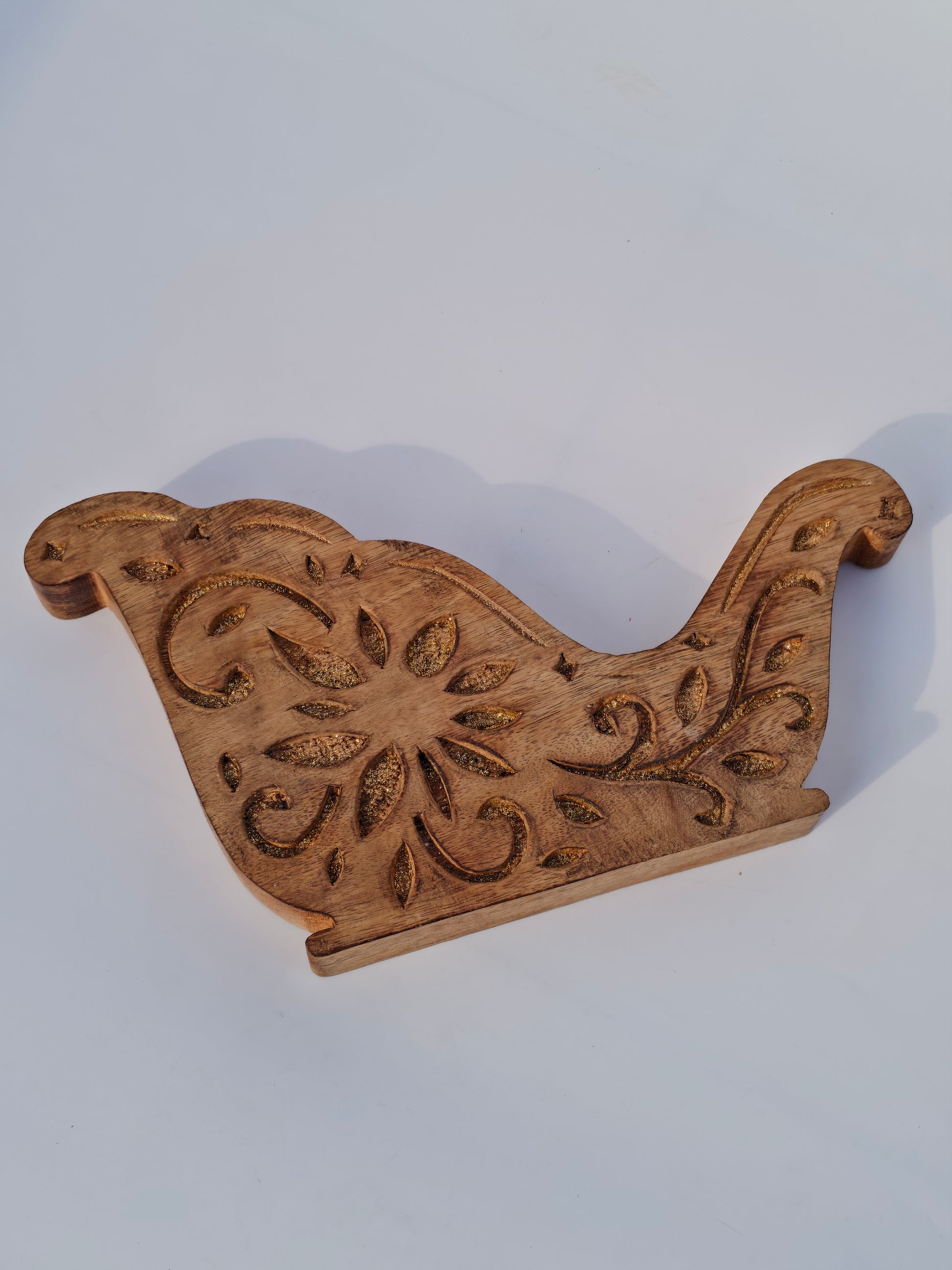 Handcrafted Wooden Sleigh Cutout with Floral Carvings – Rustic Christmas Décor