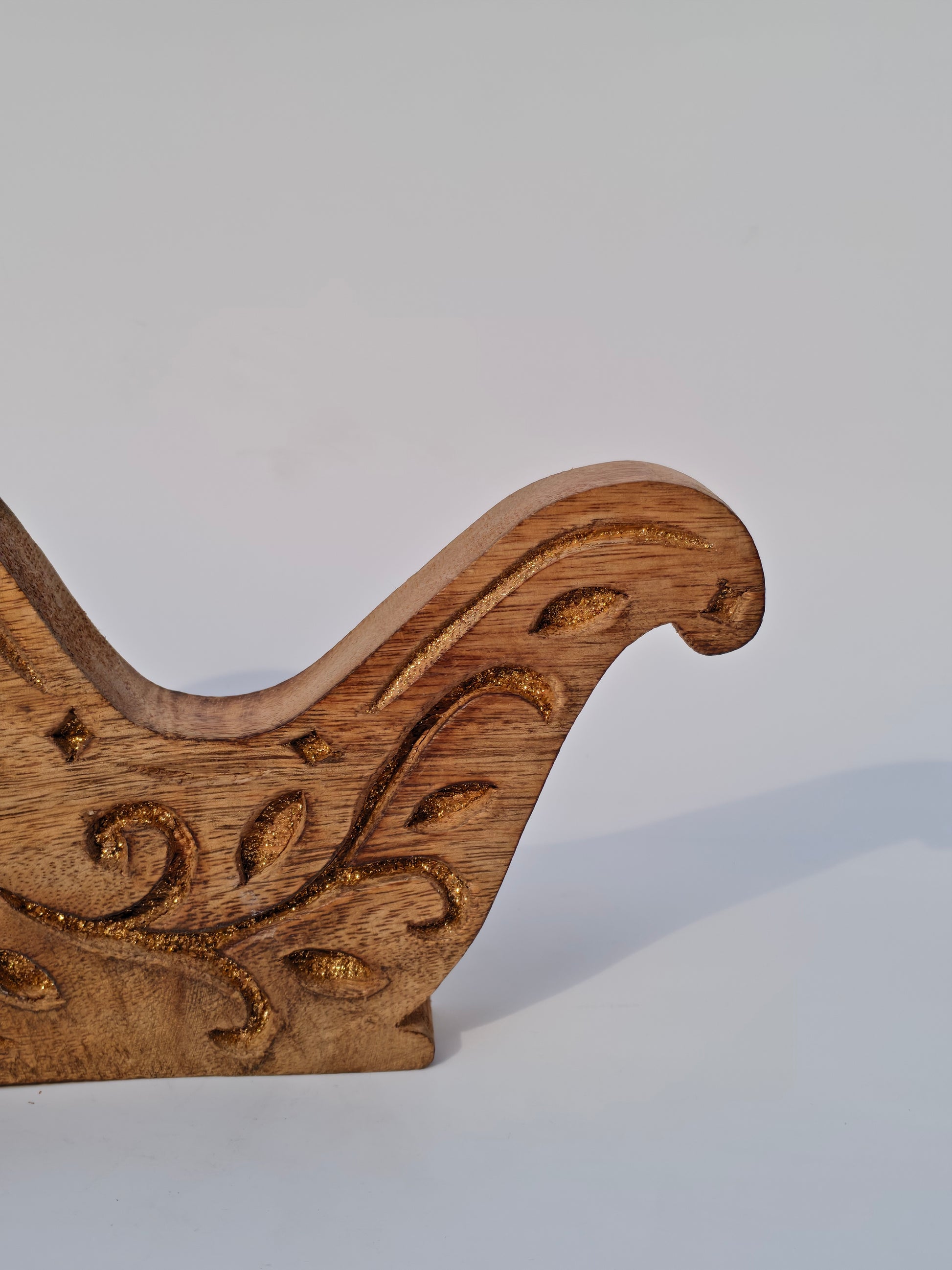Handcrafted Wooden Sleigh Cutout with Floral Carvings – Rustic Christmas Décor