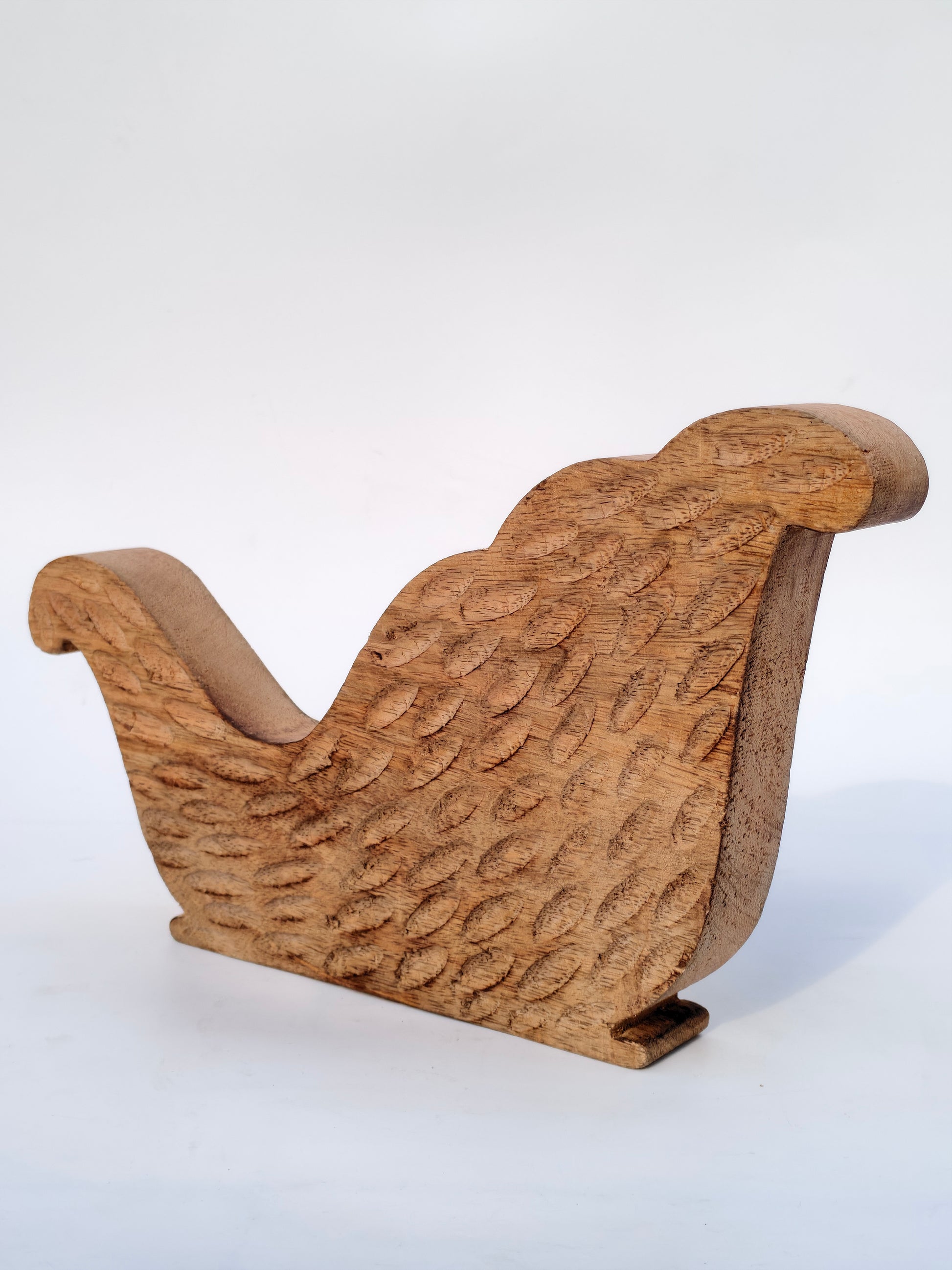 Handcrafted Wooden Sleigh Cutout with Floral Carvings – Rustic Christmas Décor