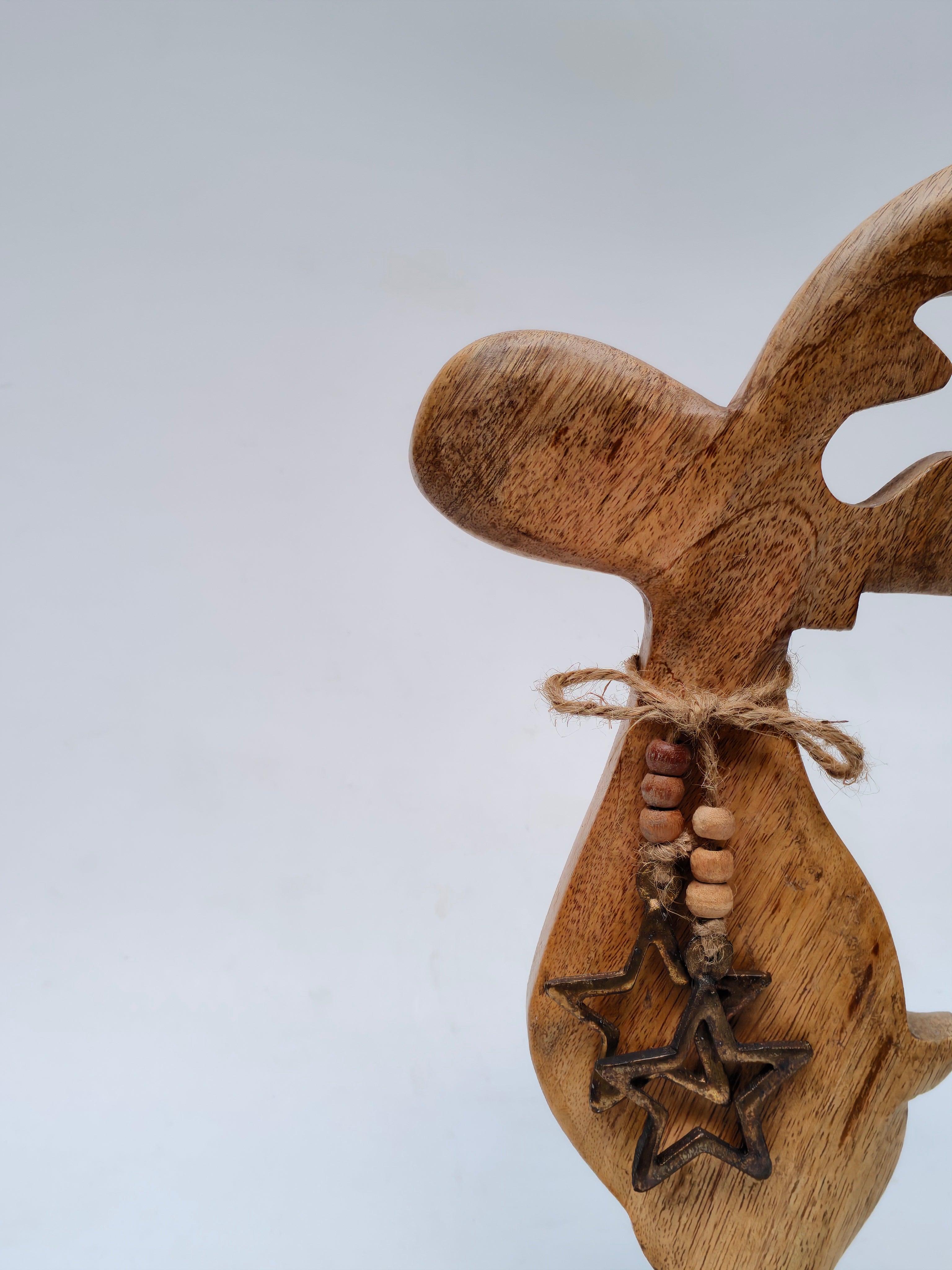 Handcrafted Solid Wood Reindeer Sculpture with Star Charm