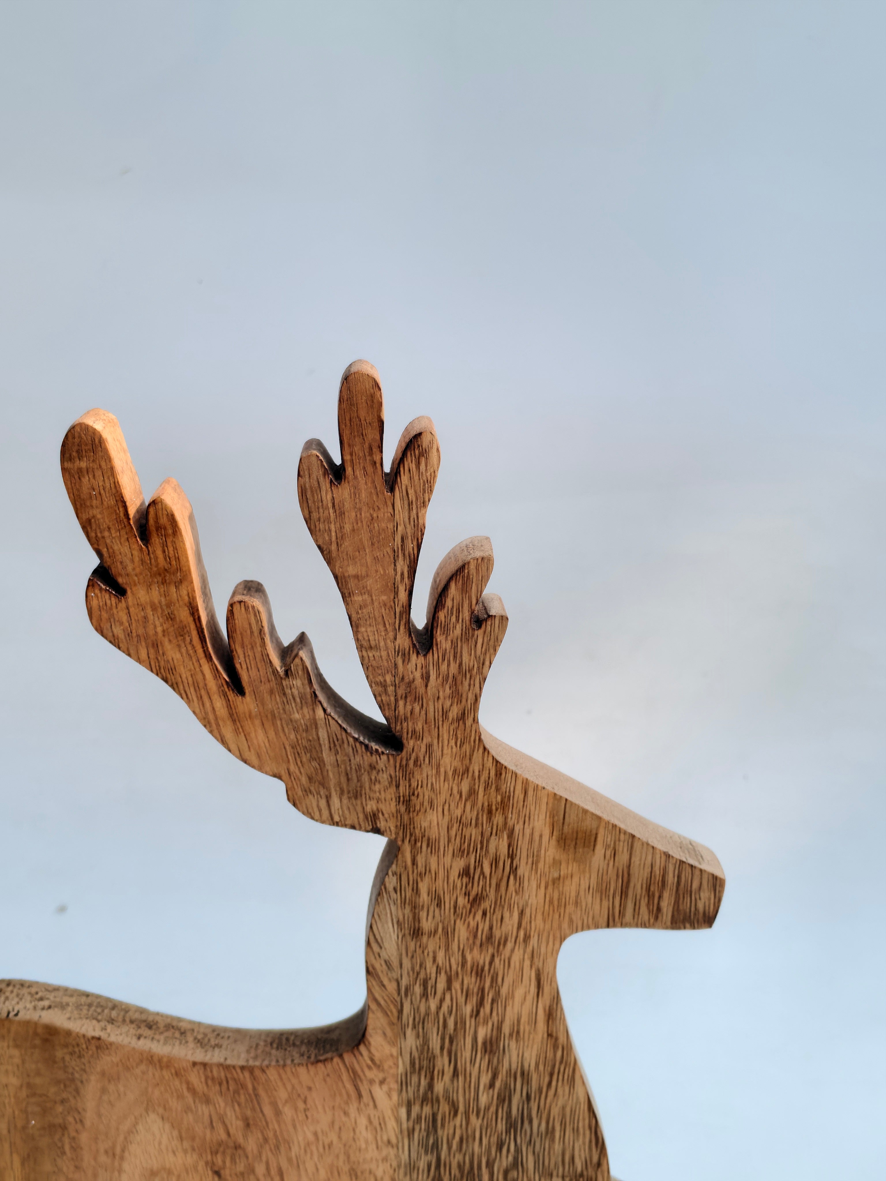Handcrafted Wooden Reindeer with Raised Leg