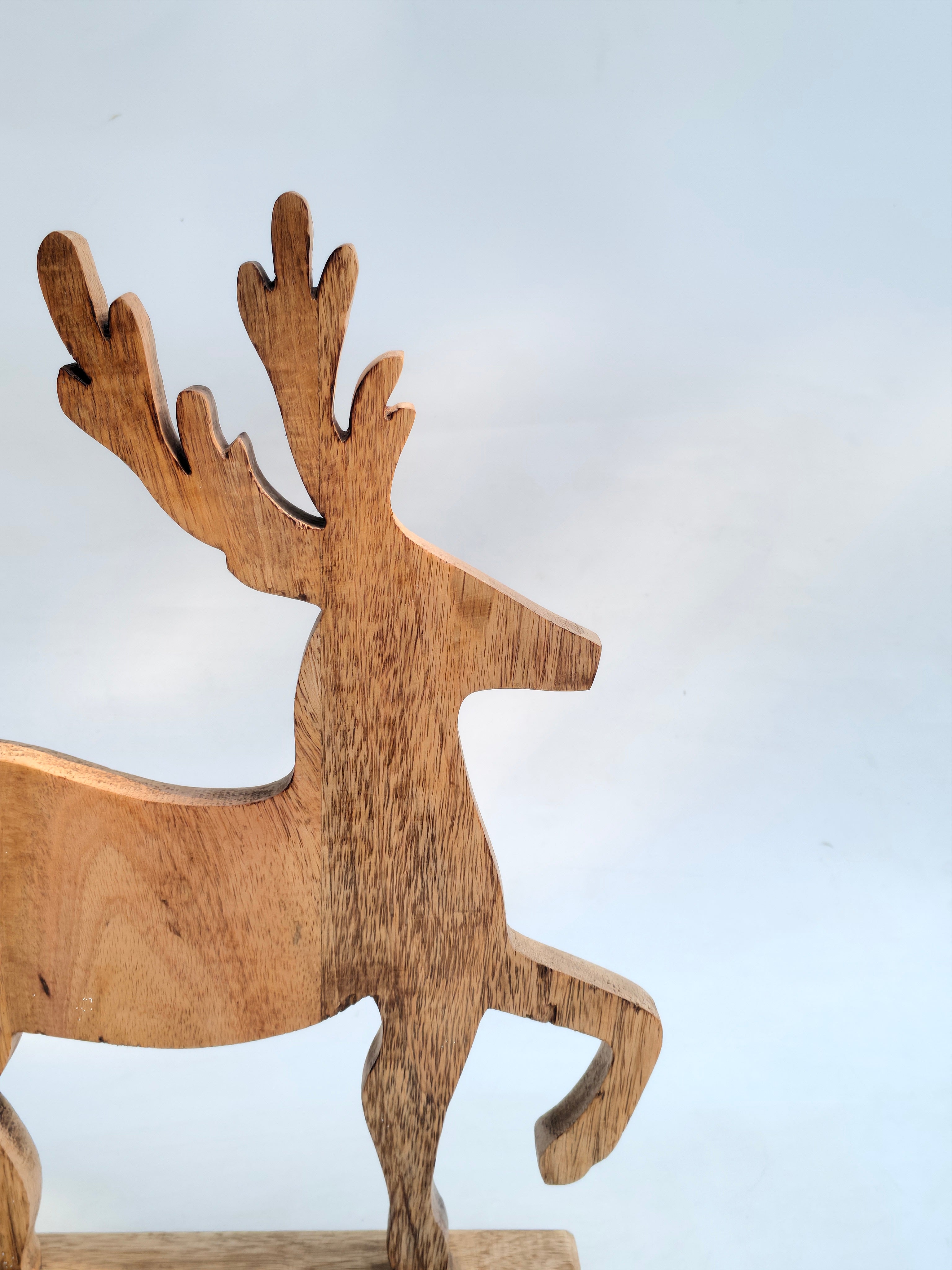 Handcrafted Wooden Reindeer with Raised Leg