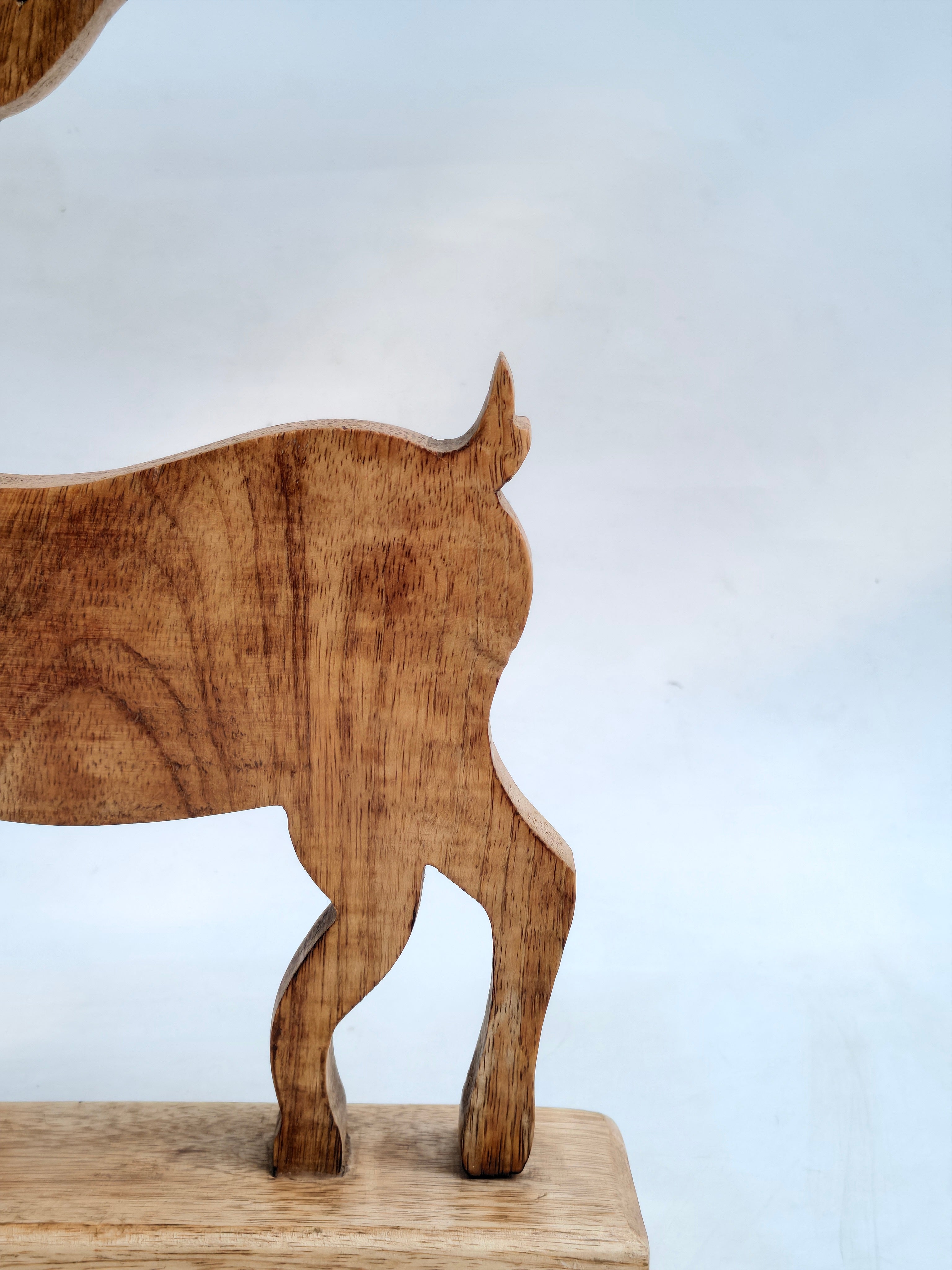 Handcrafted Wooden Reindeer with Raised Leg