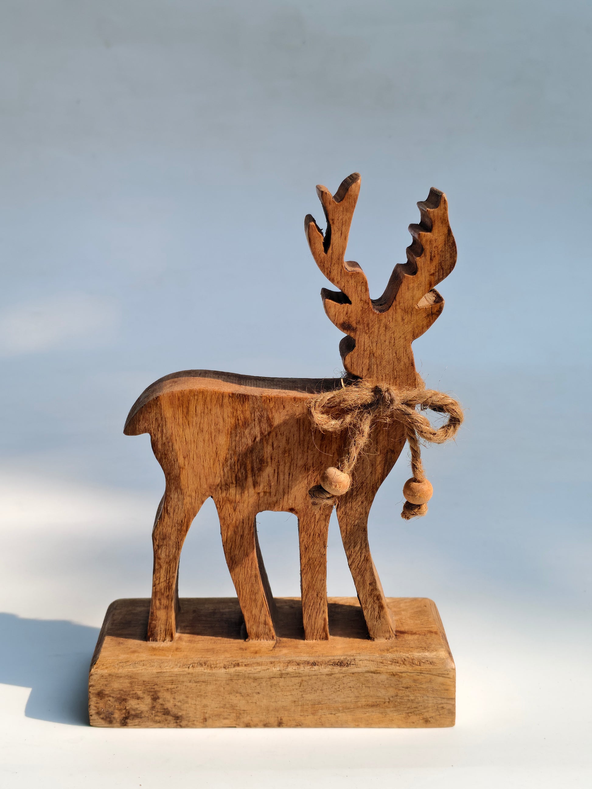Handcrafted Wooden Reindeer Figurine with Rustic Jute Bow
