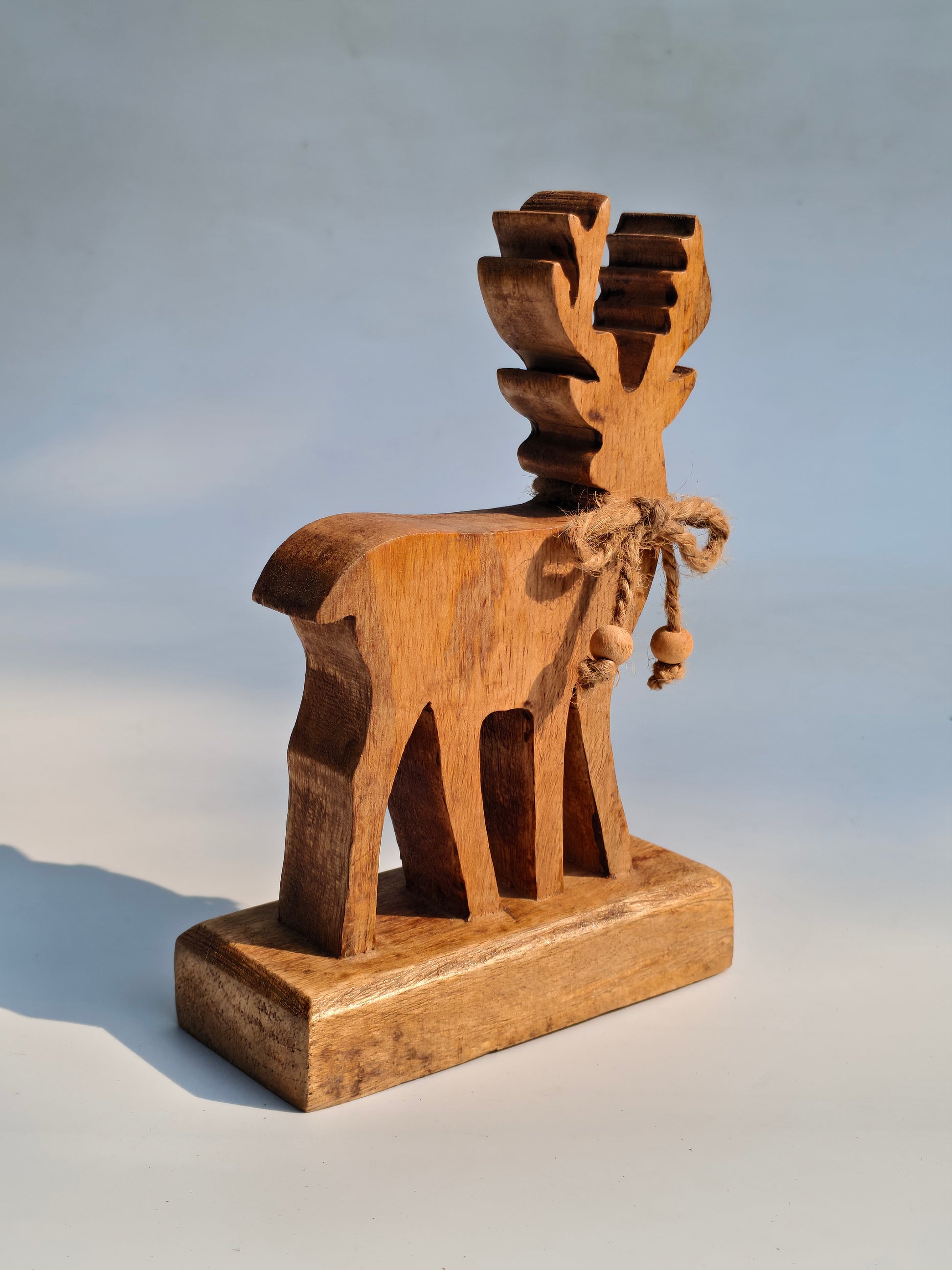 Handcrafted Wooden Reindeer Figurine with Rustic Jute Bow