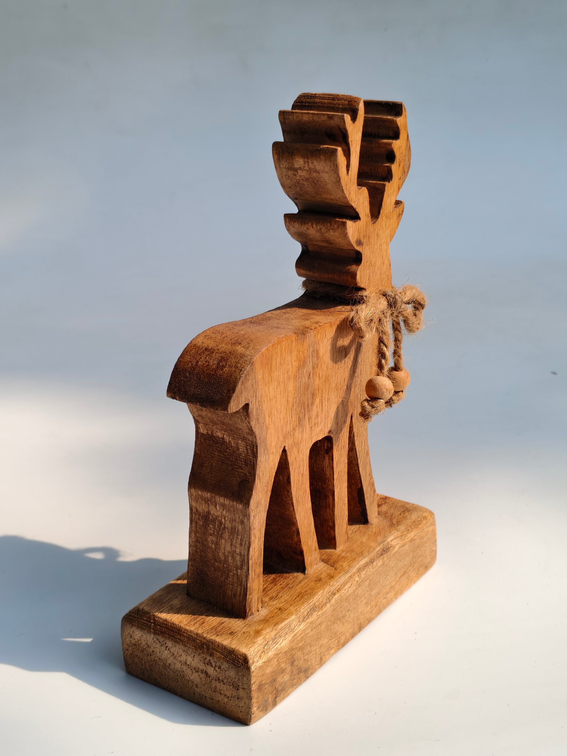 Handcrafted Wooden Reindeer Figurine with Rustic Jute Bow