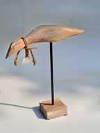 Handcrafted Wooden Bird Sculpture with Shell Accent