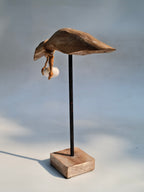 Handcrafted Wooden Bird Sculpture with Shell Accent