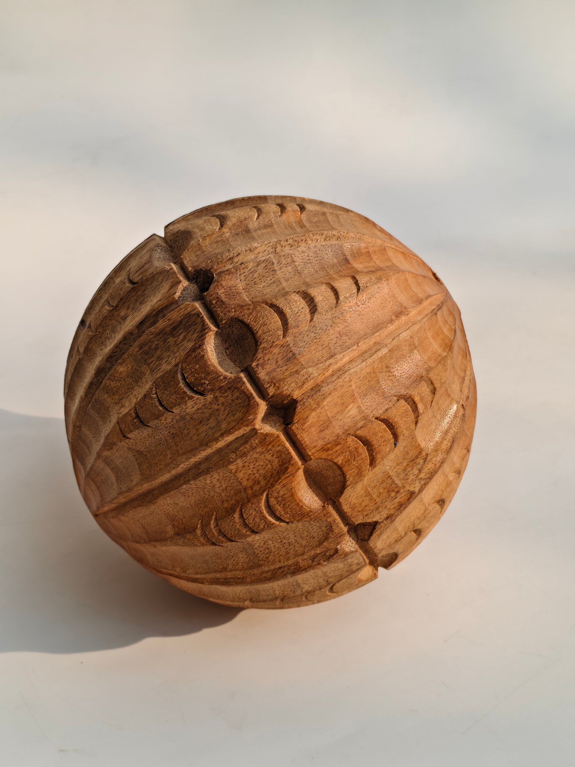 Hand-Carved Segmented Wooden Sphere | Deep Relief Grooves