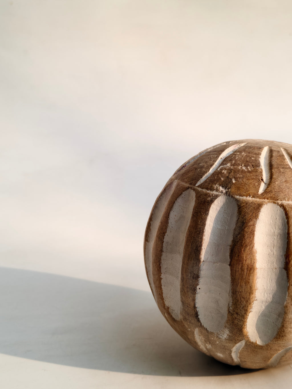 Handcrafted Wooden Decorative Ball – Carved Stripe & Leaf Design