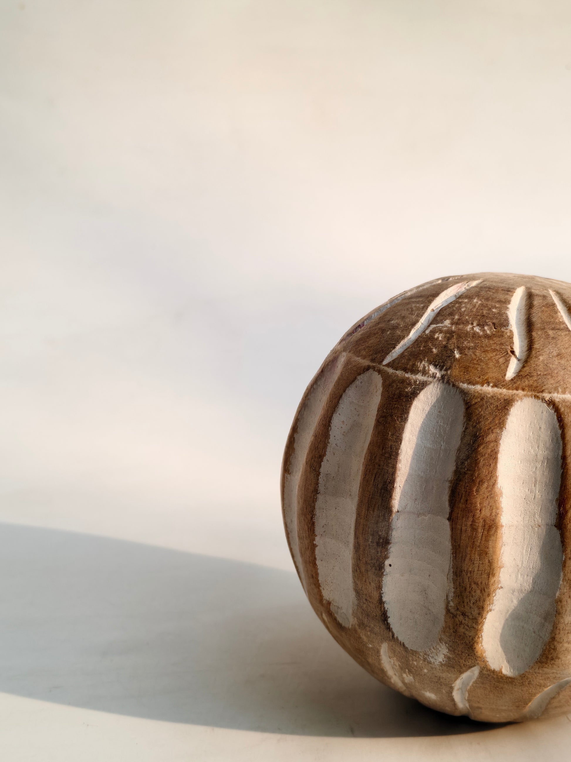 Handcrafted Wooden Decorative Ball – Carved Stripe & Leaf Design