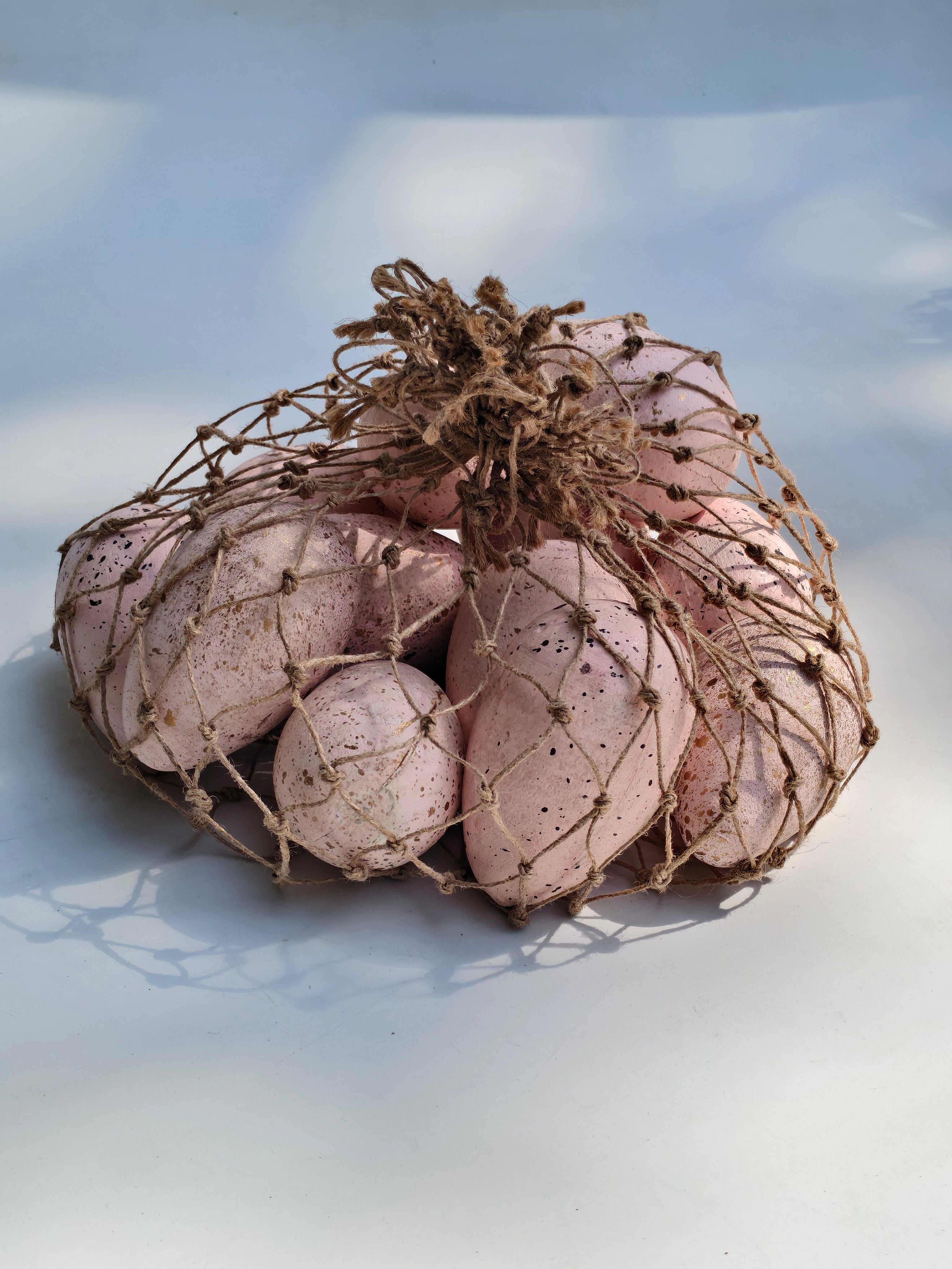 Solid Wood Blush Speckled Decorative Eggs Set of 8 in Knitted Jute Pouch | Hand Painted Matte Pink and Gold Coloured Artisan Home Decor