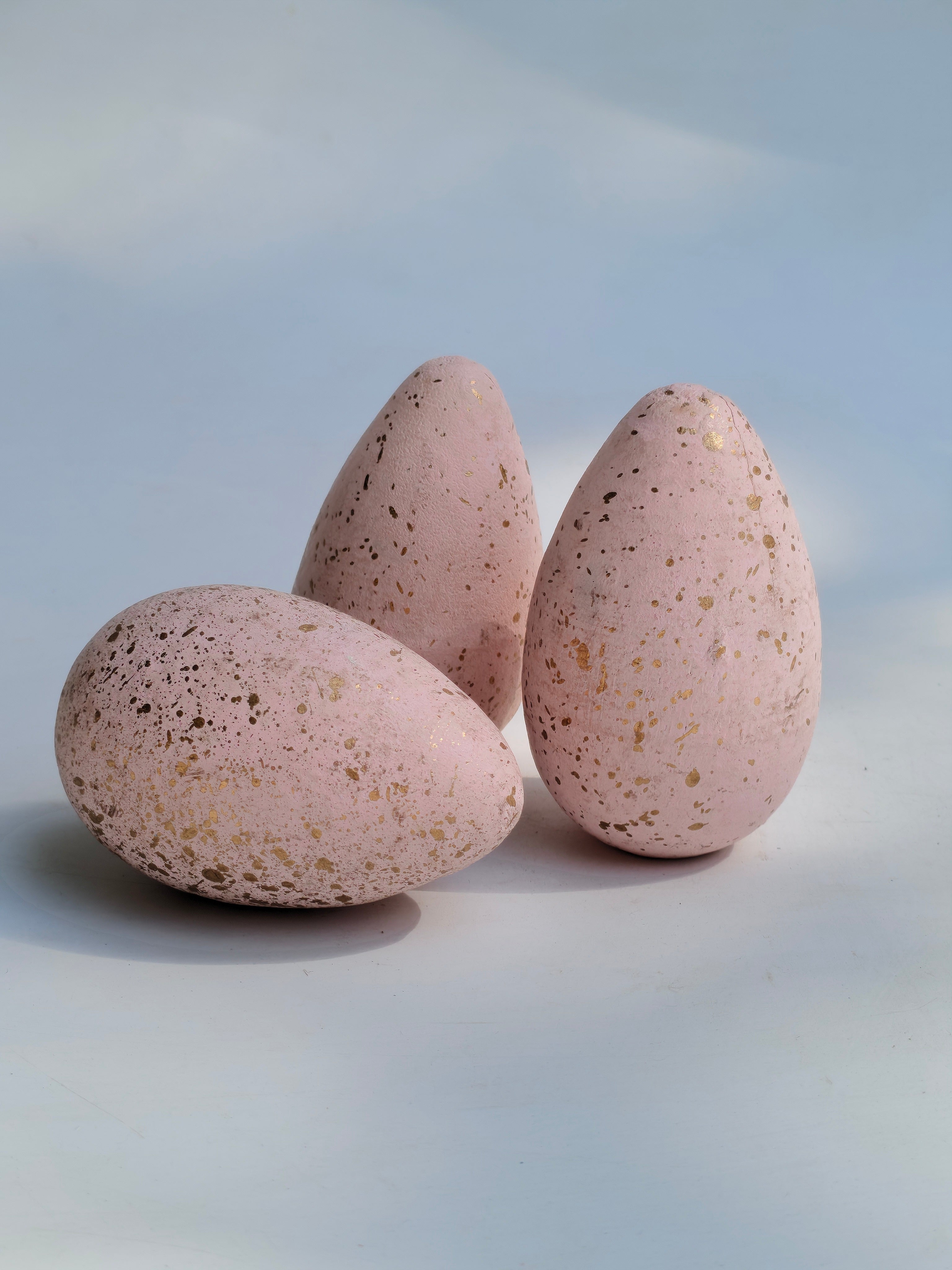 Solid Wood Blush Speckled Decorative Eggs Set of 8 in Knitted Jute Pouch | Hand Painted Matte Pink and Gold Coloured Artisan Home Decor