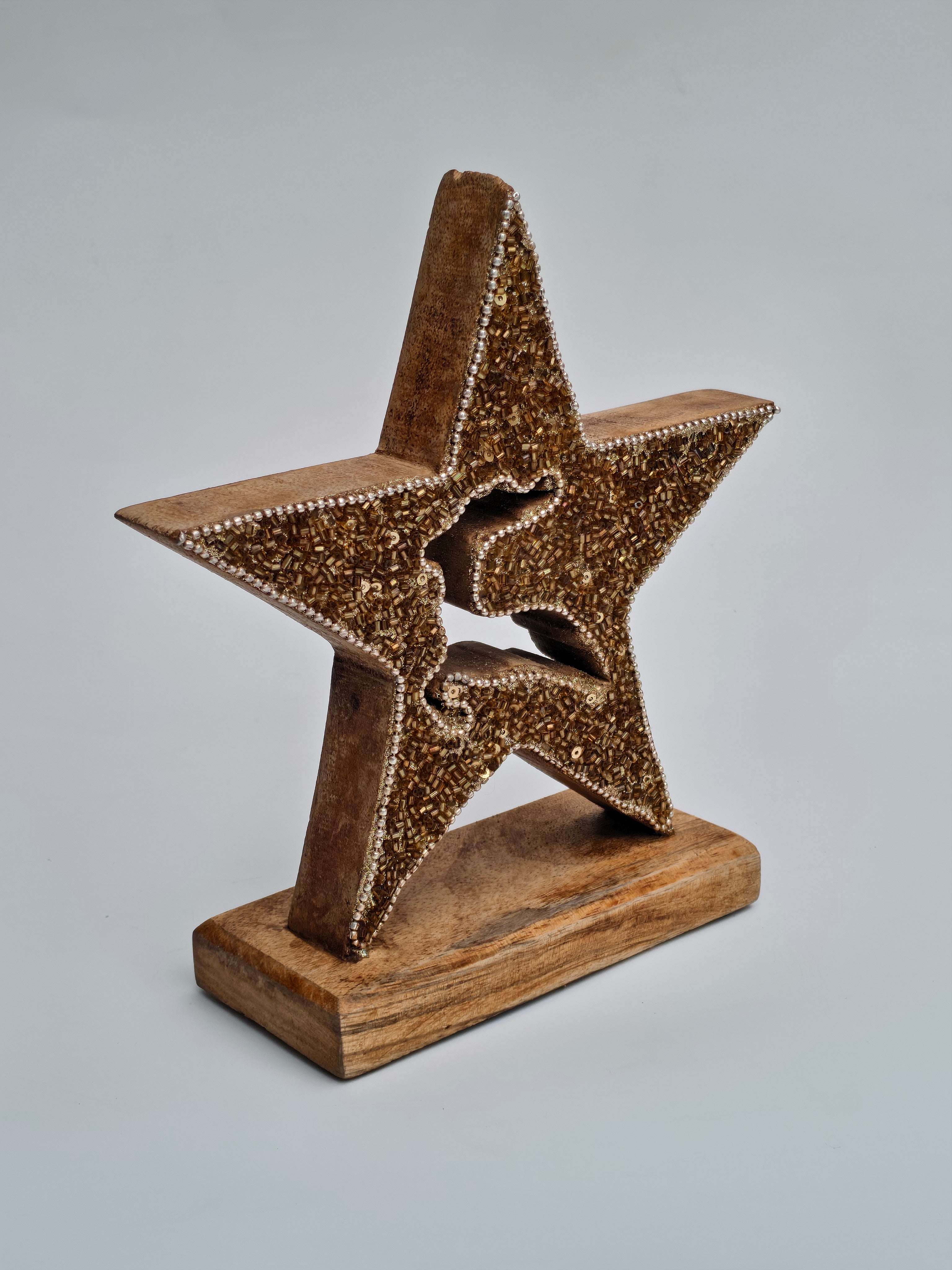 Golden Beaded Star with Reindeer Design on Wooden Base