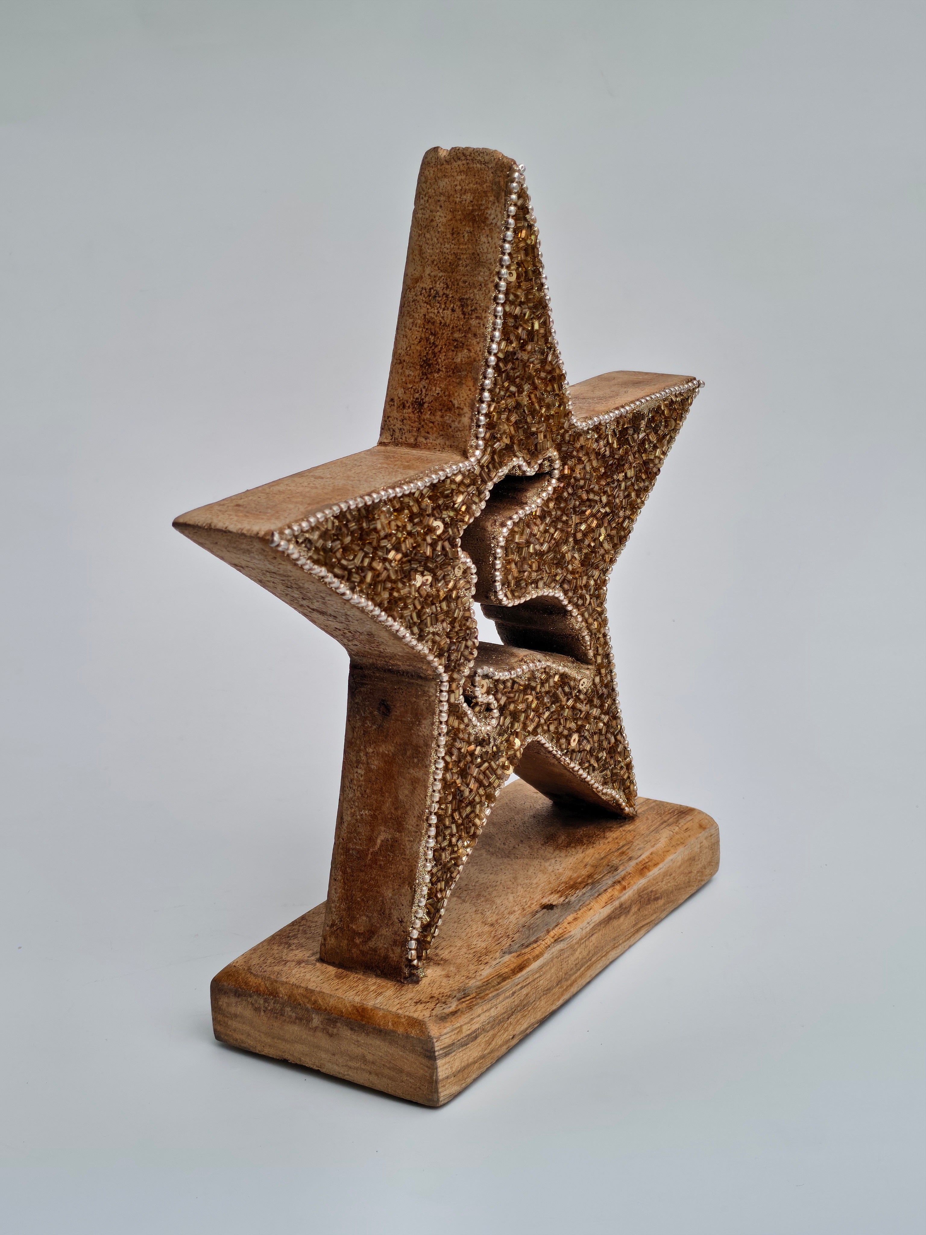 Golden Beaded Star with Reindeer Design on Wooden Base