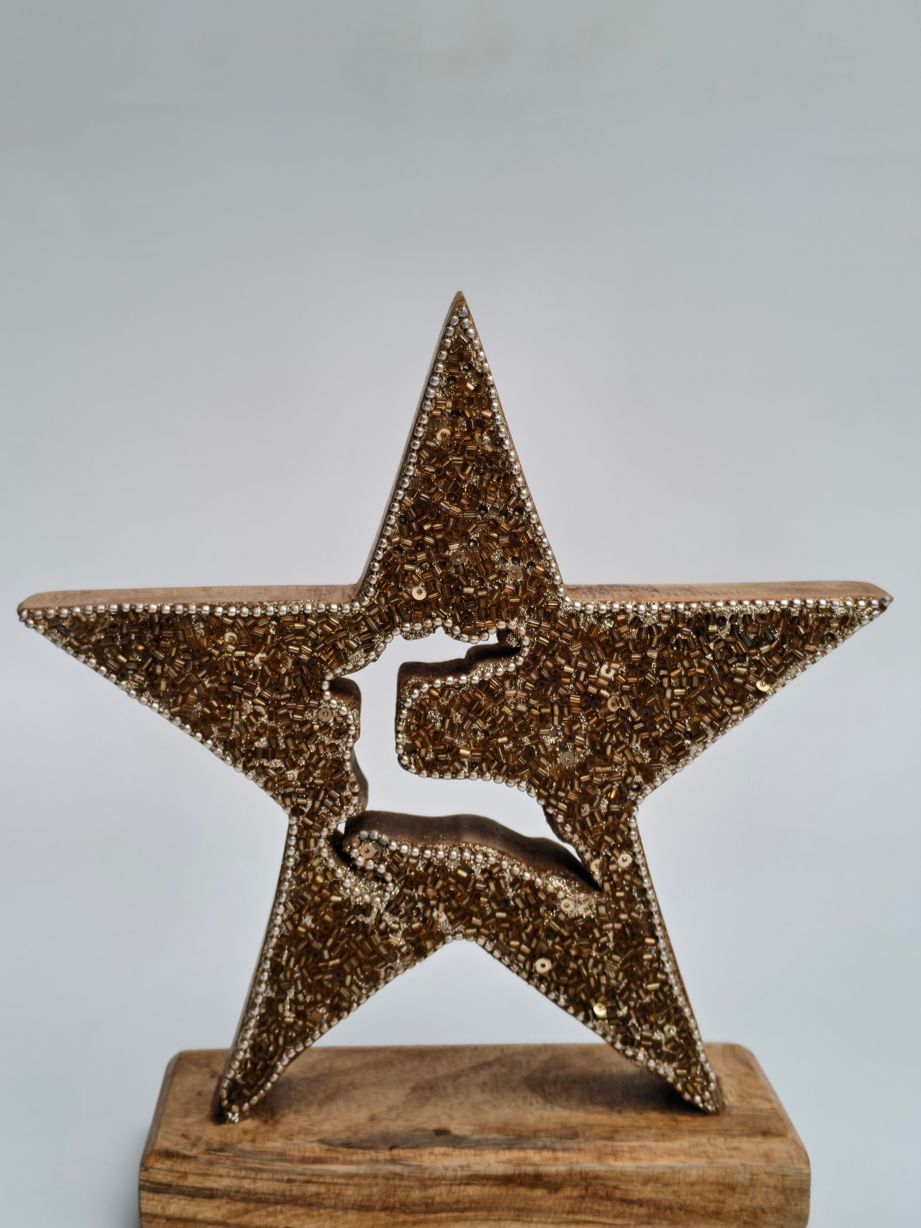 Golden Beaded Star with Reindeer Design on Wooden Base